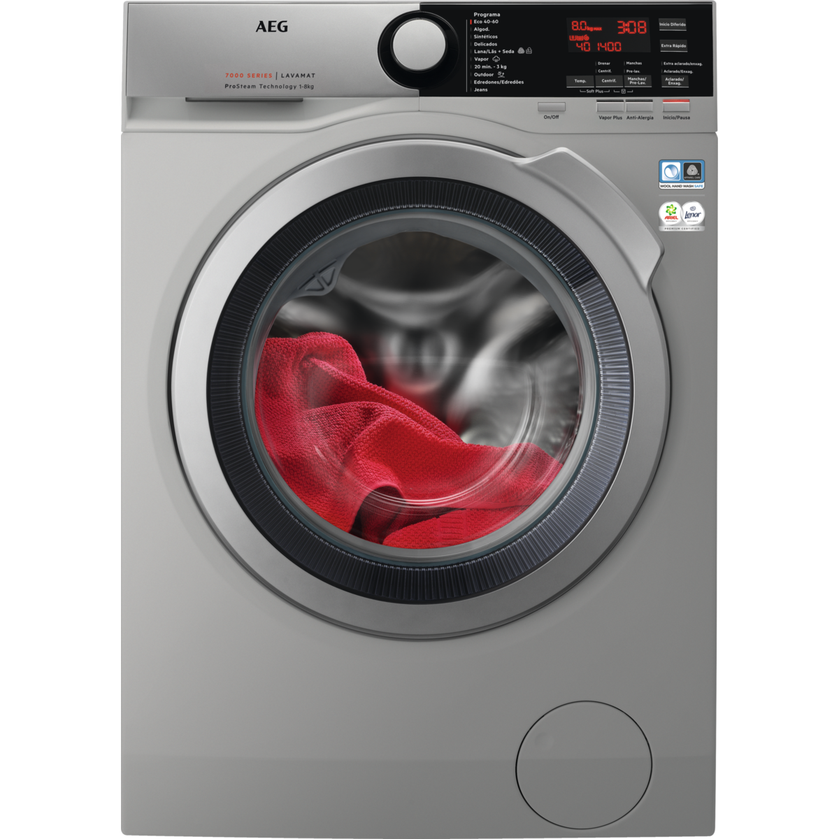 Lavadora con tejido rojo en su interior. La máquina es de color plateado.