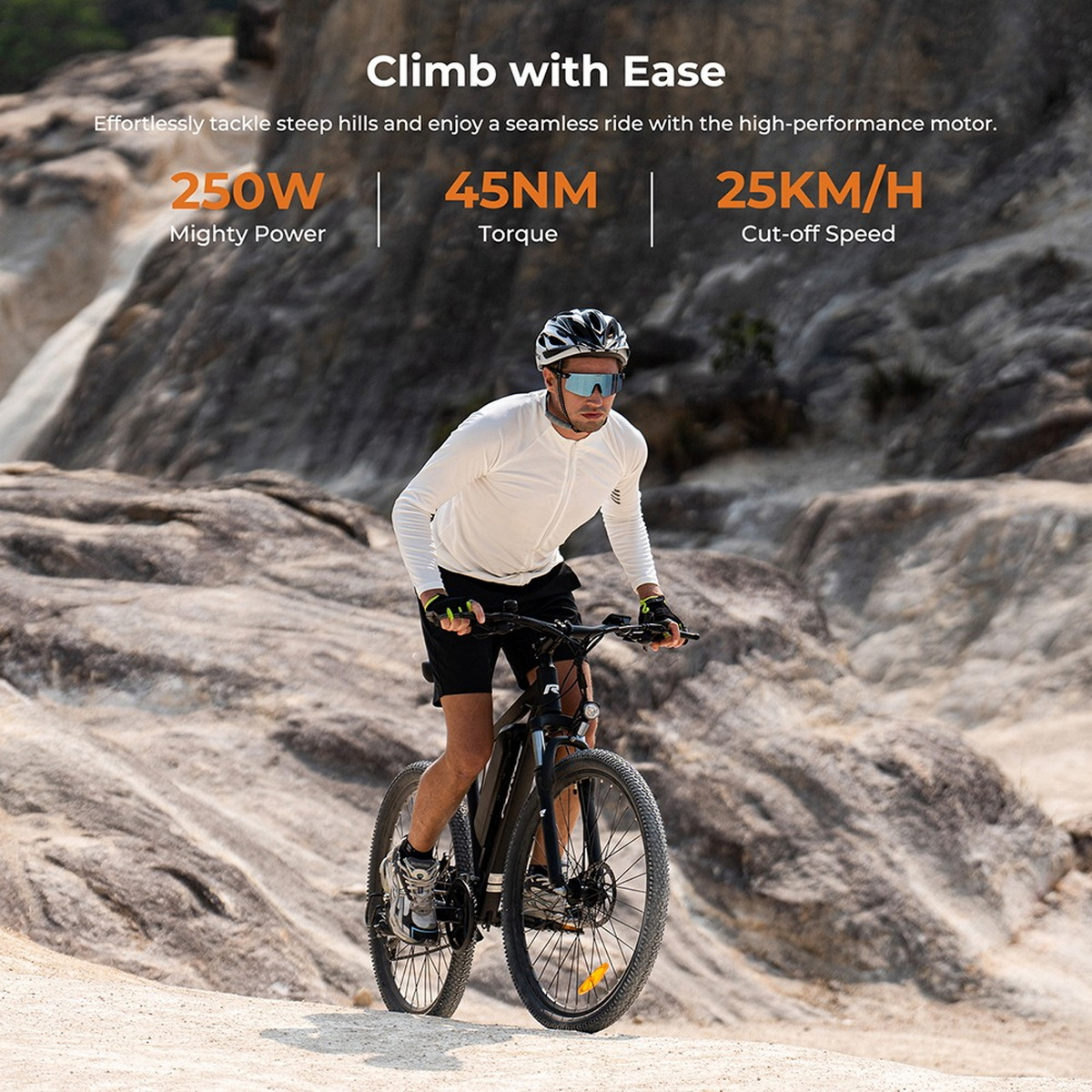 Mężczyzna jadący rowerem elektrycznym pod górę, z parametrami mocy, momentu obrotowego i prędkości obok niego.