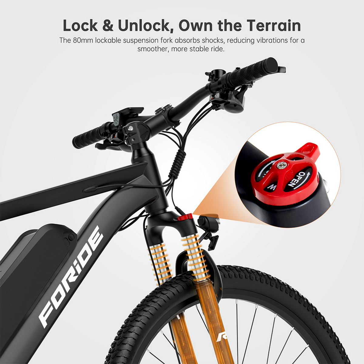 Nahaufnahme der Vorderradgabel und Bedienelemente eines E-Bikes. Rotes Zifferblatt sichtbar.