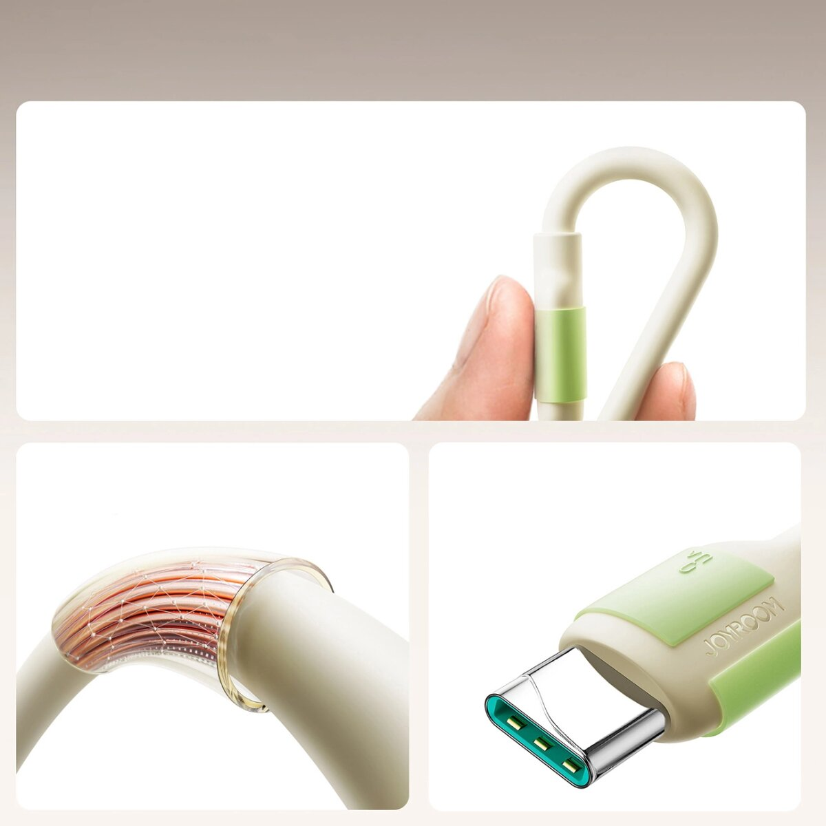 Gros plan d'un câble de chargement blanc avec un accent vert. Des parties du câble et d'une main sont visibles.