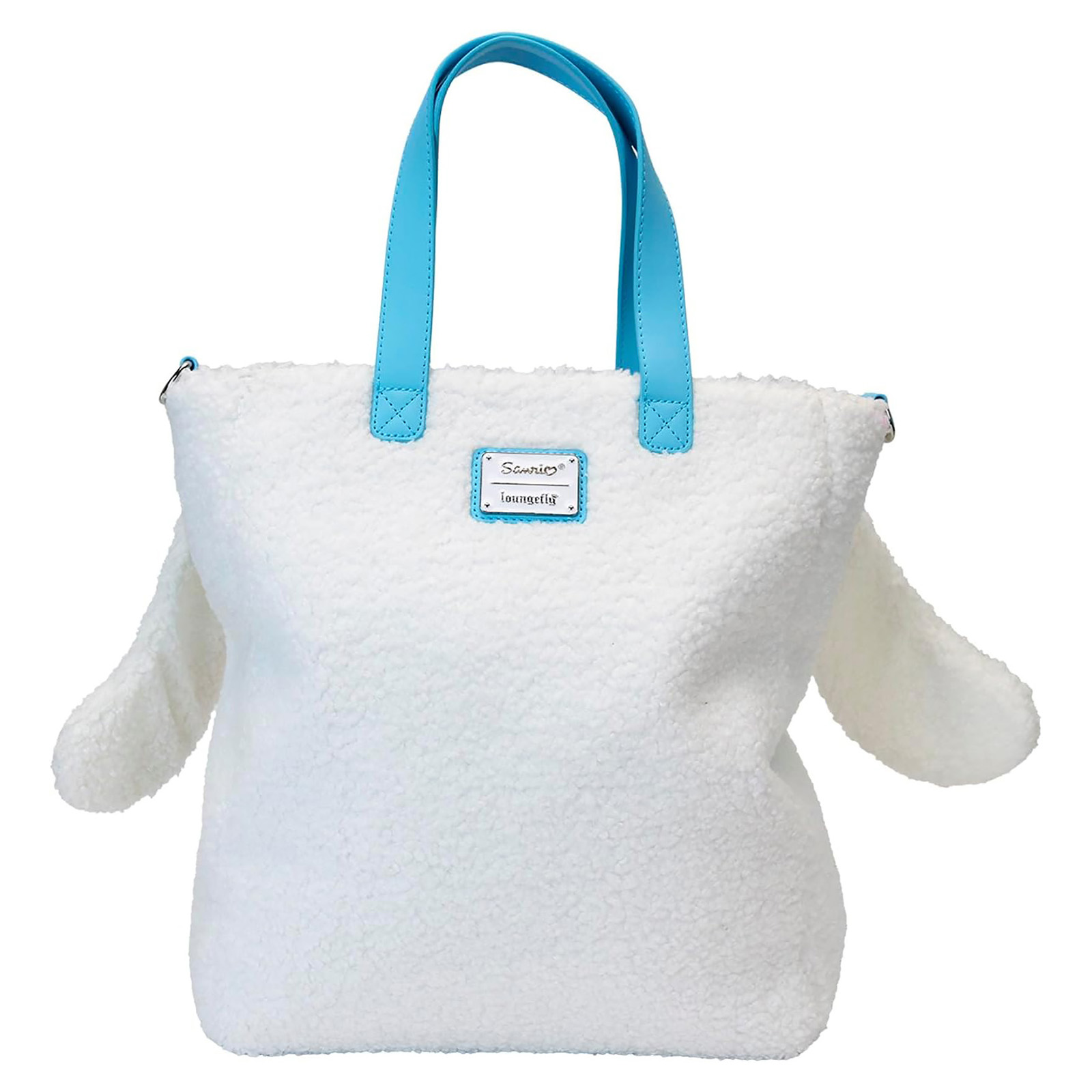 Weiße, flauschige Tragetasche mit Cinnamoroll-Gesicht, blauen Griffen und einem kleinen Markenetikett.