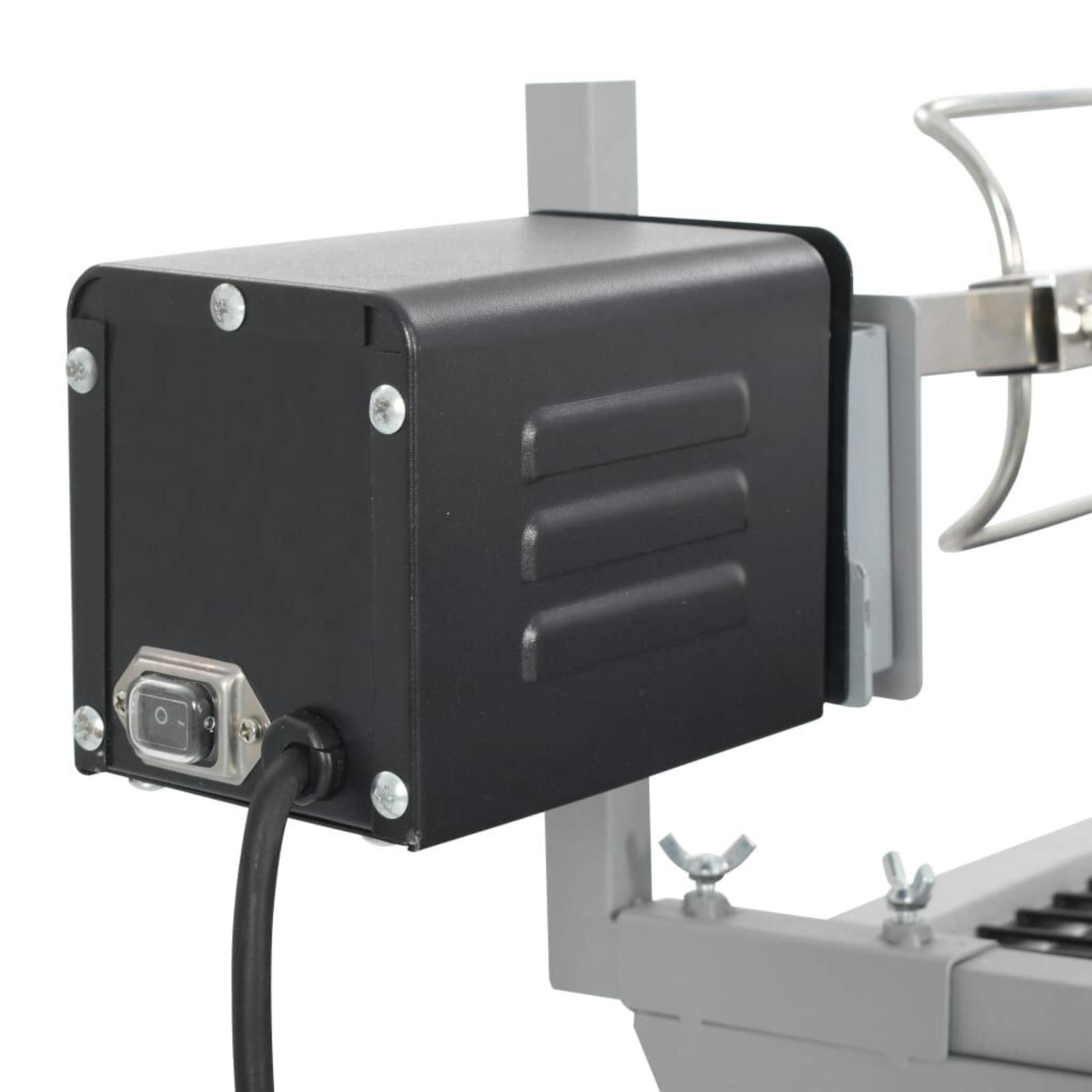 Ein schwarzer Motor eines Drehspießgrills. Es hat ein Netzkabel und einen Schalter.