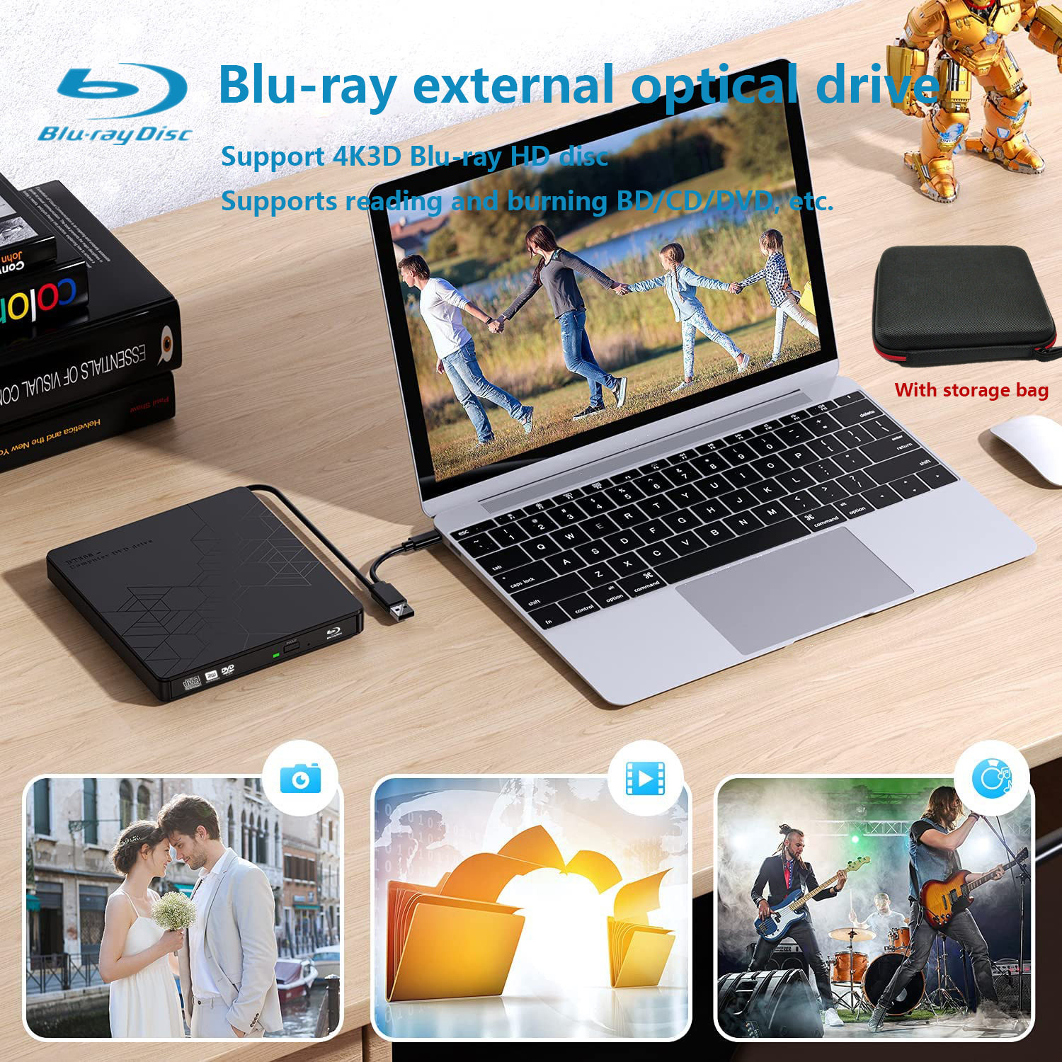 Laptop mit DVD-Laufwerk. Bilder von einem Paar, Ordnern und einer Band. Holzschreibtisch.