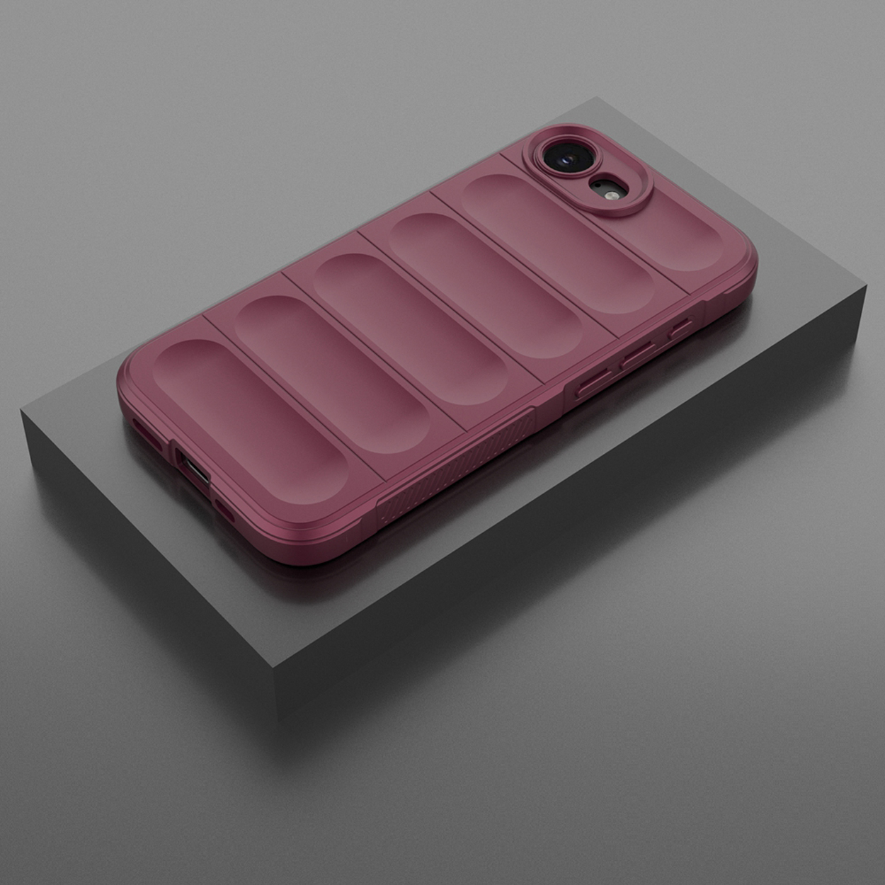 Bordeaux telefoonhoes op een donkergrijze ondergrond, met een geribbeld ontwerp.