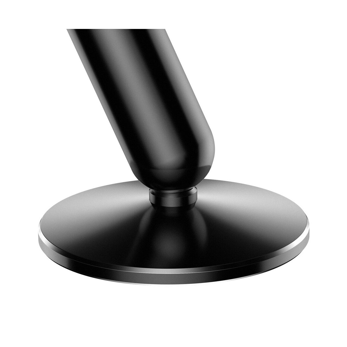 Zbliżenie czarnej podstawy uchwytu samochodowego. Jest okrągła i wykonana z błyszczącego materiału.