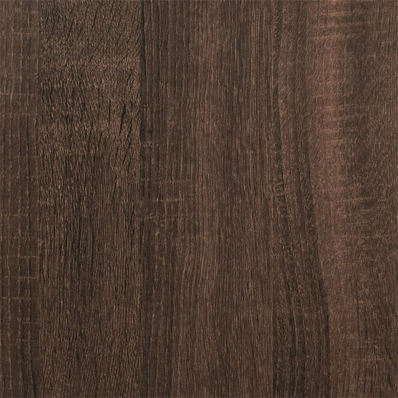 Nahaufnahme einer Holzoberfläche mit schwarzer Farbe und Holzmaserung.