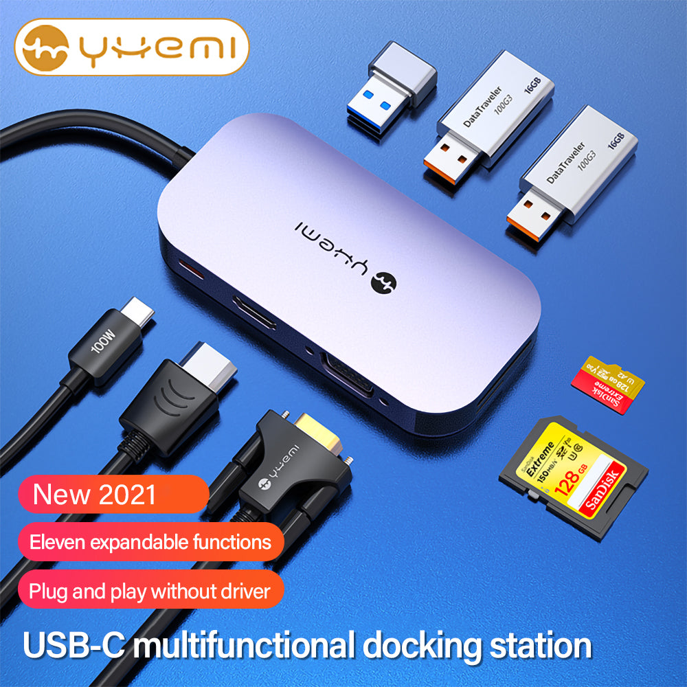 Ein silberner USB-Hub mit angeschlossenen Kabeln, USB-Laufwerken und Text.