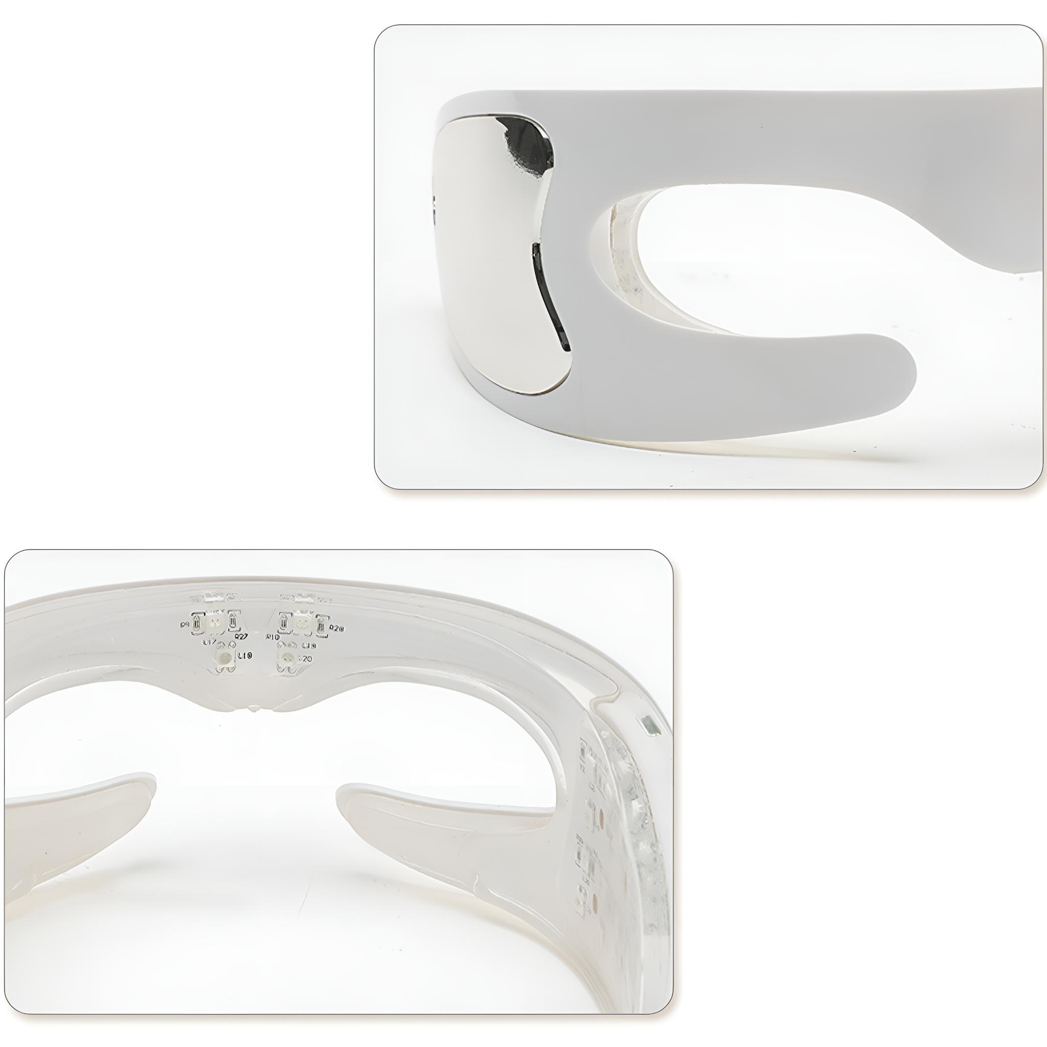 Nahaufnahme eines weißen Gesichtsmassagegeräts. Zeigt das Design des Geräts und die inneren Lichter.