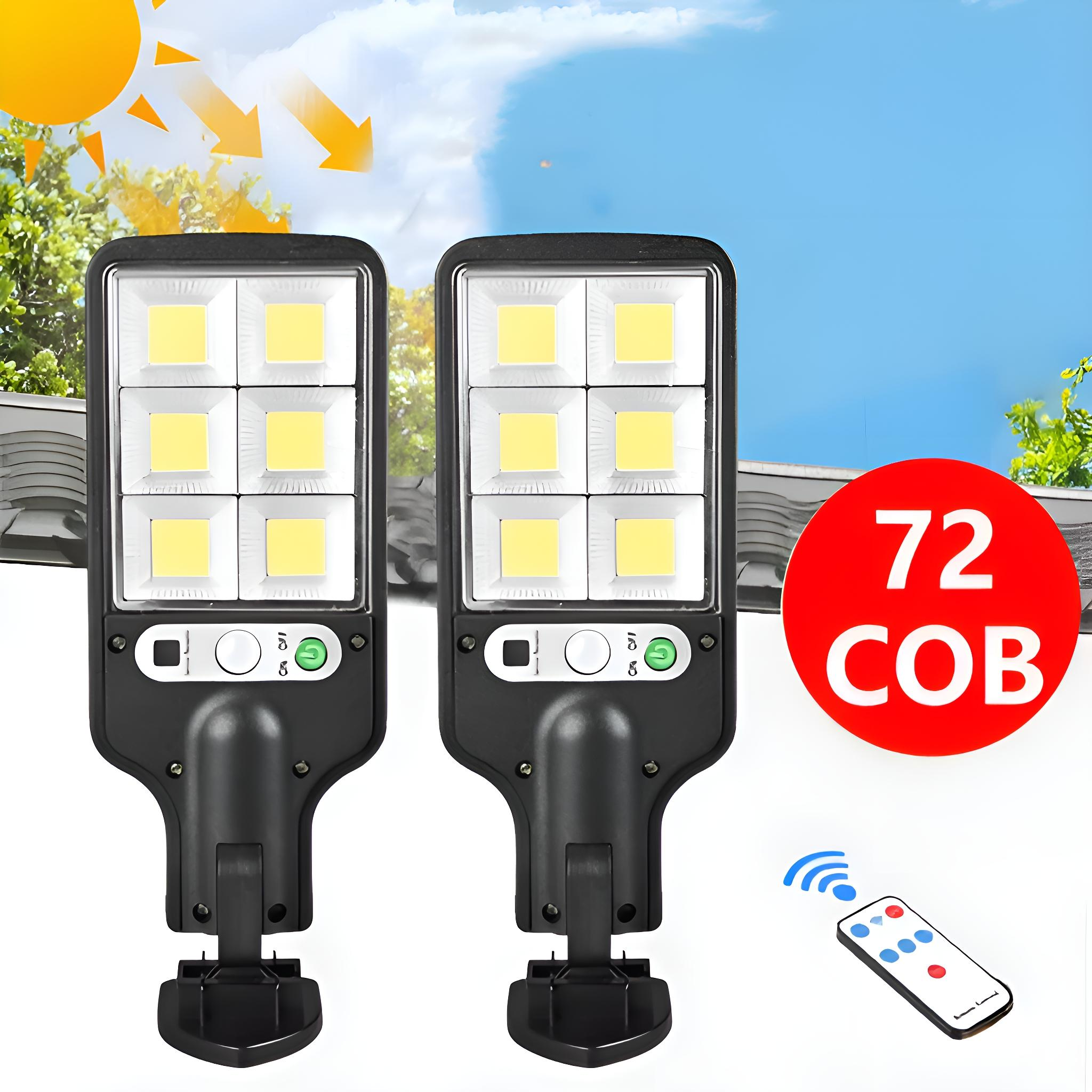 Zwei Solarleuchten. Die Leuchten haben eine weiße Platte und eine Fernbedienung.