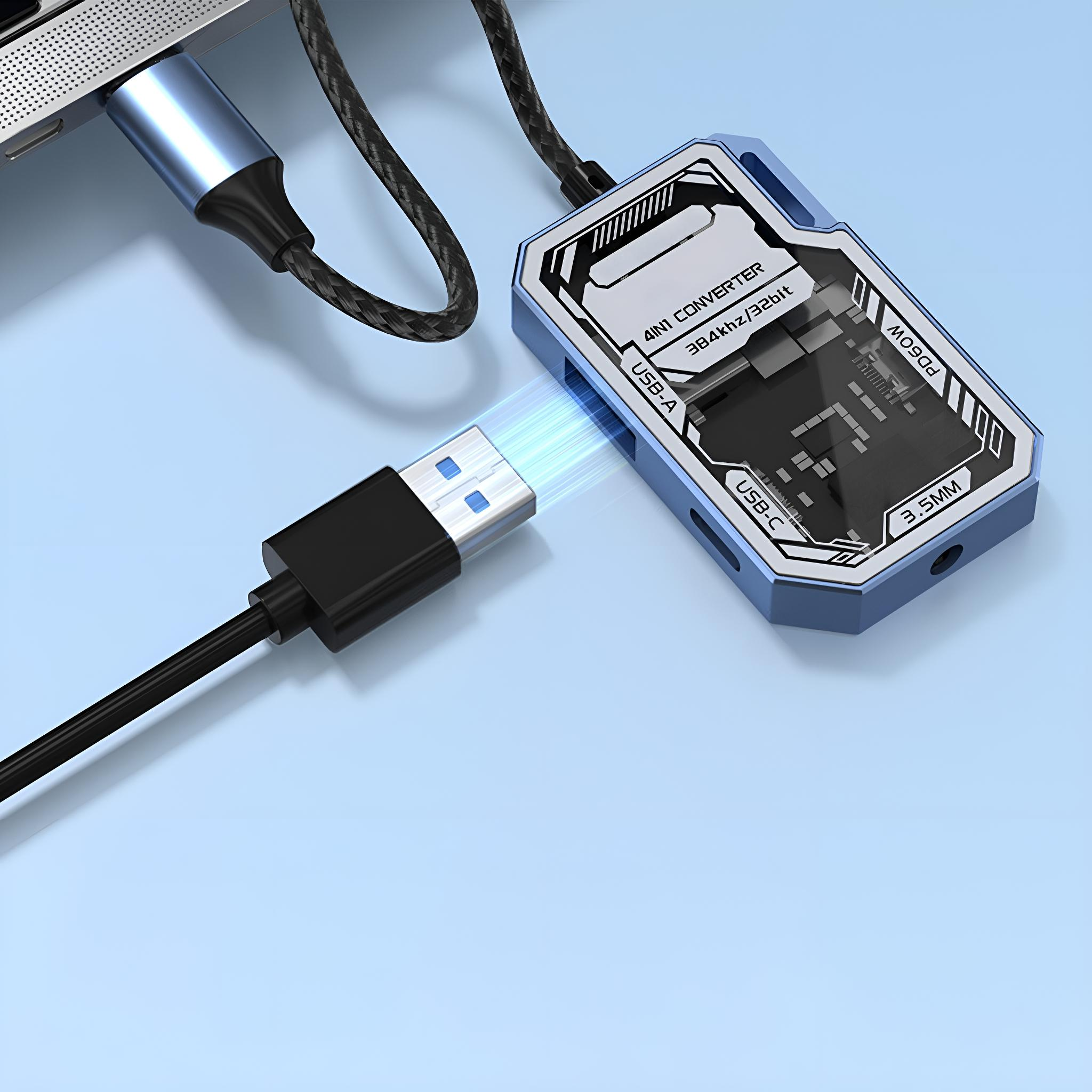 Blauer und silberner USB-C-Hub, an Laptop und USB-A-Kabel angeschlossen. Blauer Hintergrund.