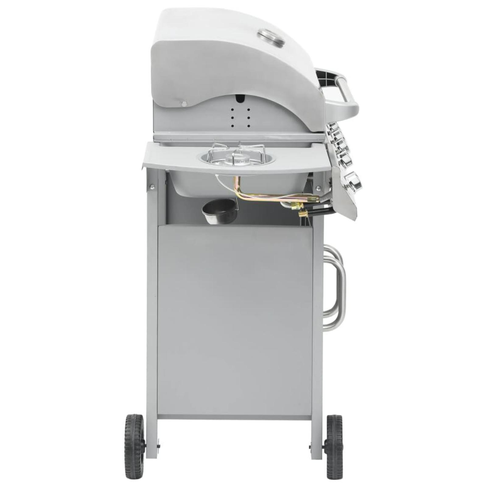 Seitenansicht eines silbernen Außengrills mit Warmhalterost und Gasbrenner.