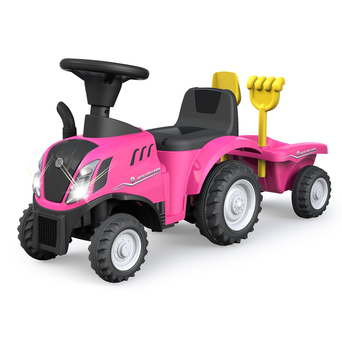 Tractor de juguete rosa con remolque. Tiene volante y faros. Una pala amarilla está unida al remolque.