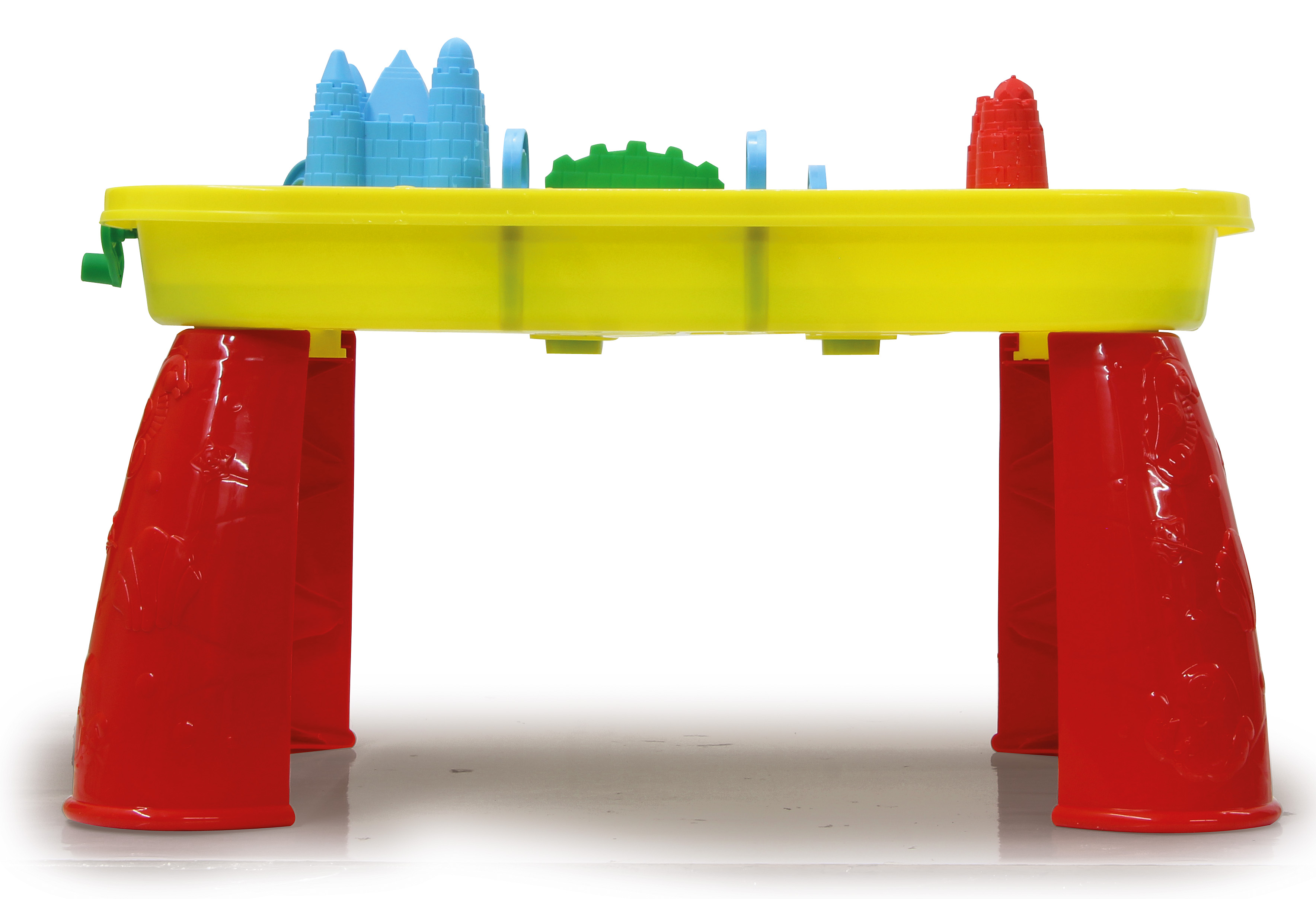 Żółty stół do piasku z czerwonymi nogami i niebieskimi, zielonymi i czerwonymi akcesoriami do piasku.