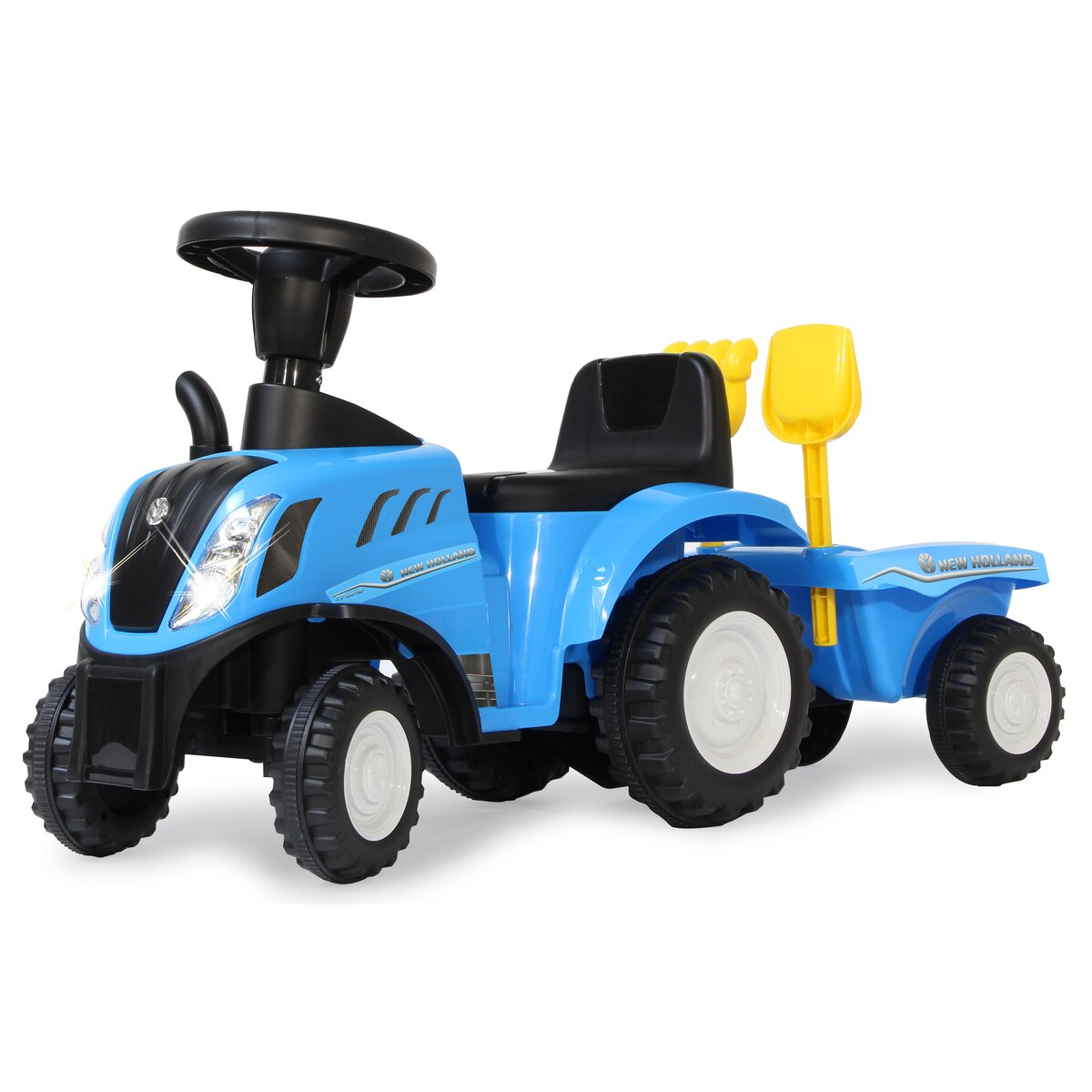 Tractor de juguete azul con remolque. Herramientas amarillas. Marca New Holland, ruedas blancas.