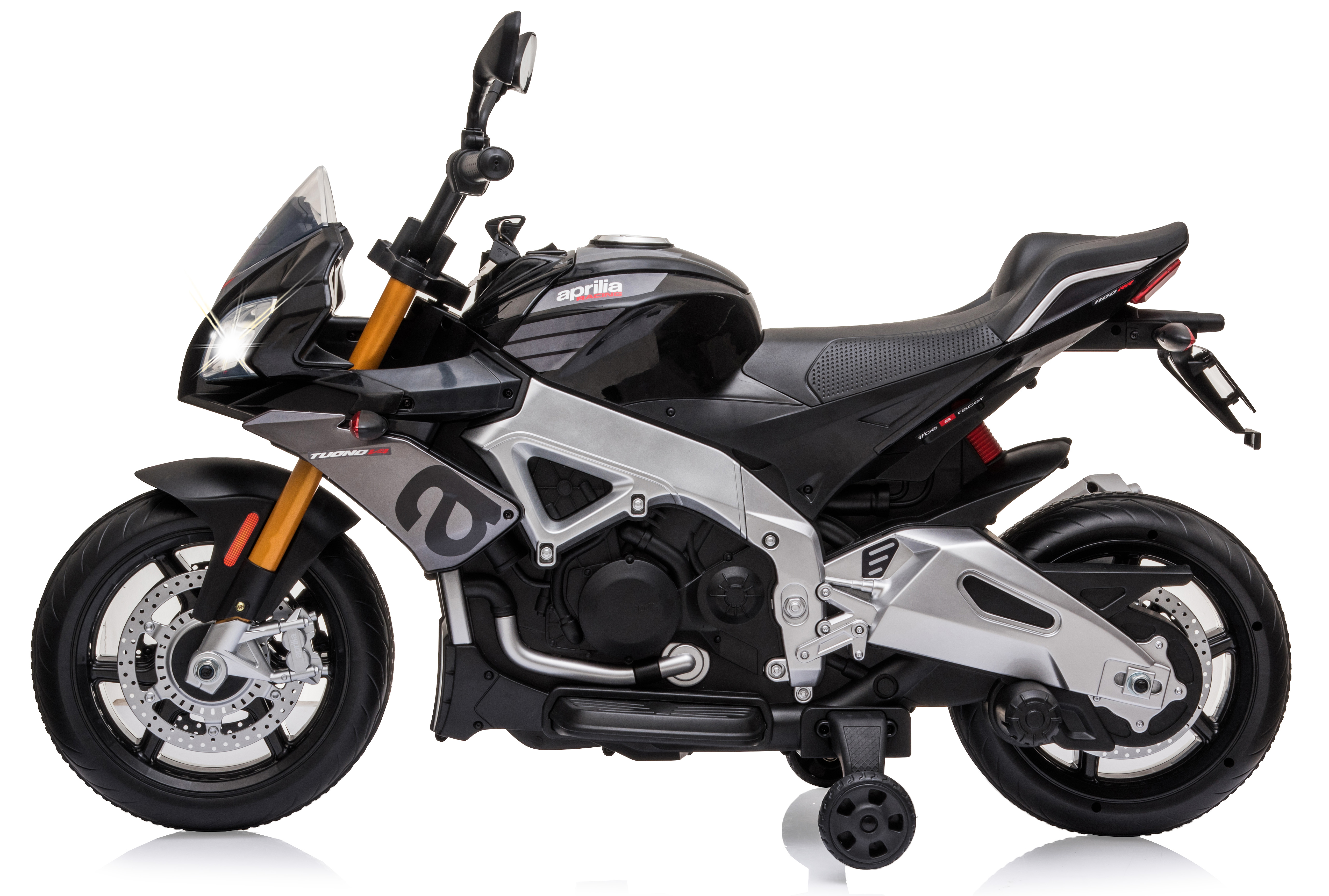 Motocicletta giocattolo nera e grigia su una superficie bianca. Vista laterale con rotelle.