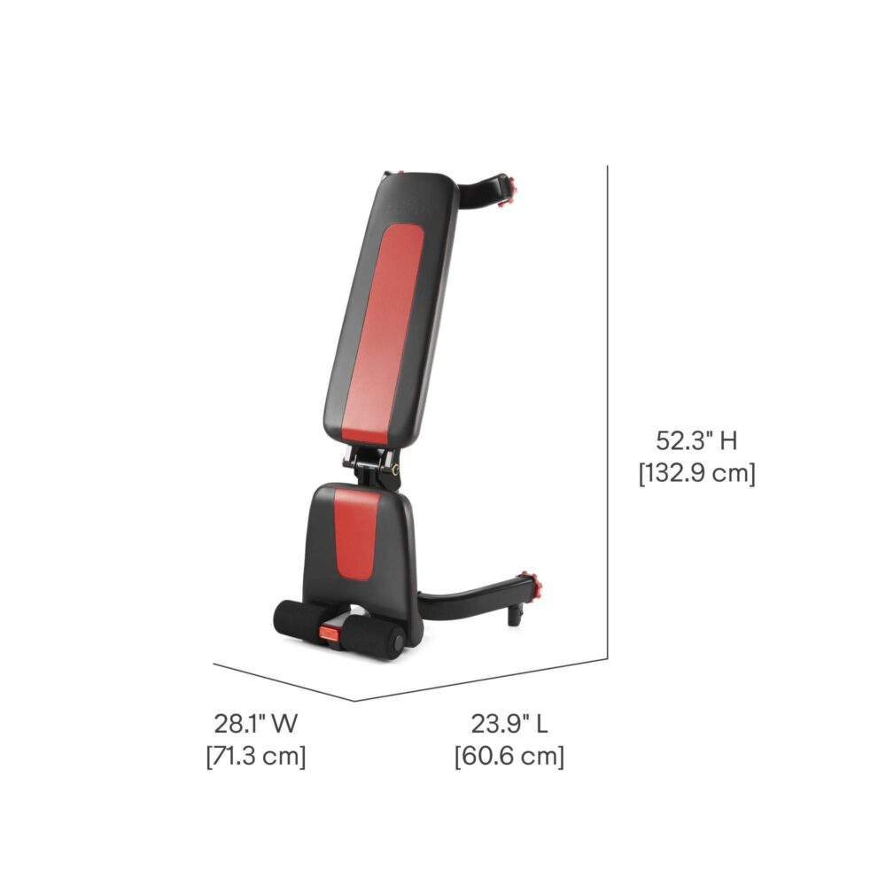 Banco de pesas negro y rojo con dimensiones: 23.9"L x 28.1"W x 52.3"H.