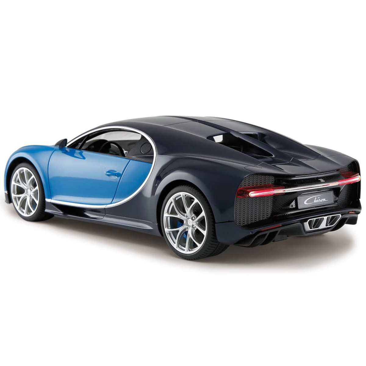 Ein blau-schwarzer Sportwagen. Das Auto steht auf einer weißen Oberfläche.