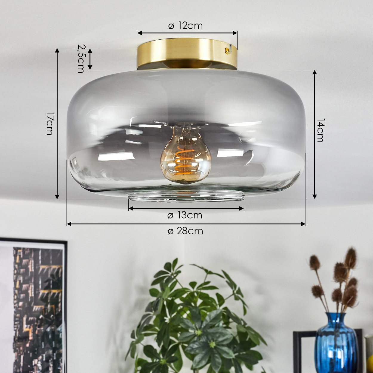 Deckenleuchte mit angegebenen Abmessungen. Enthält einen goldenen Sockel, transparentes Glas und eine Glühbirne.