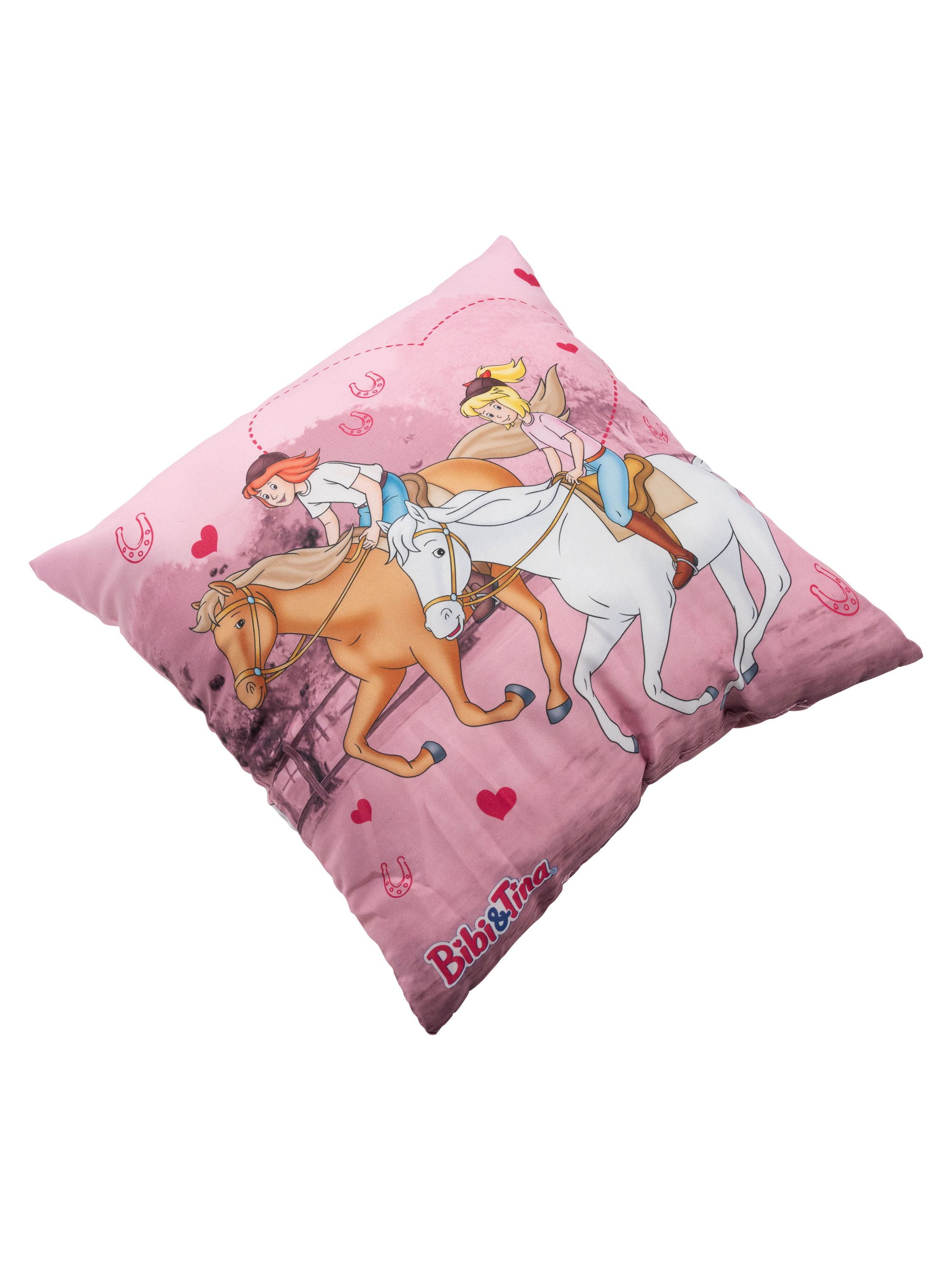 Rosa Kissen mit einem Cartoon von zwei Mädchen, die Pferde reiten, mit Herzen und Hufeisen.