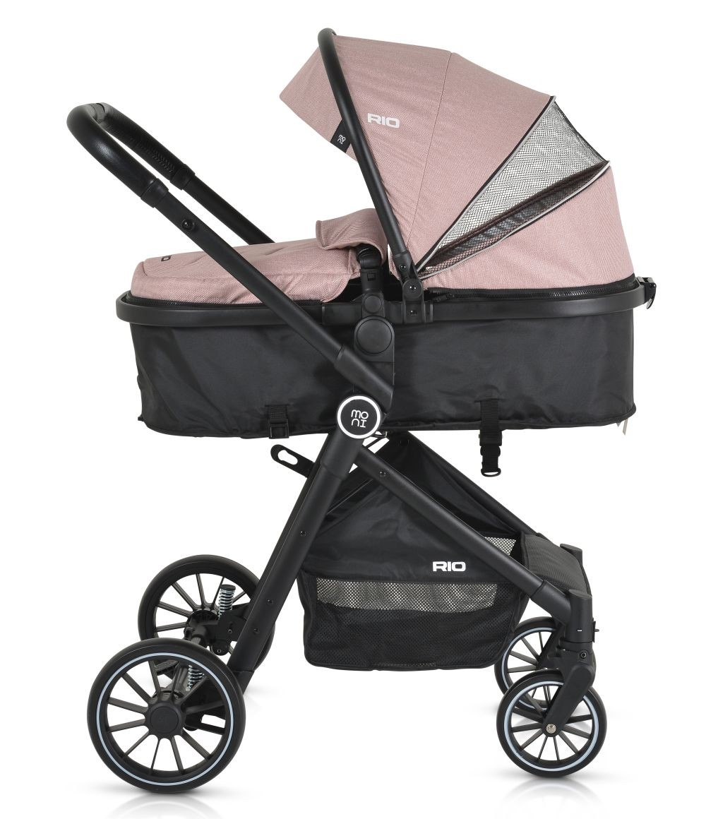 Pinker Kinderwagen mit schwarzem Rahmen, Seitenansicht, weißer Hintergrund.
