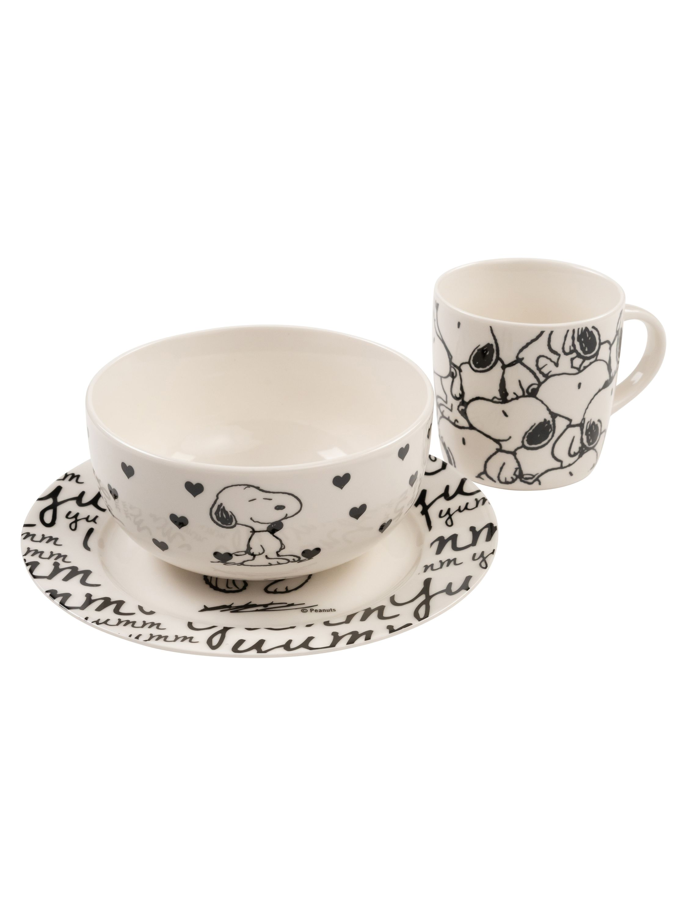Snoopy-Geschirrset: ein Teller, eine Schüssel und eine Tasse. Teller und Schüssel haben Snoopy-Zeichnungen. Die Tasse zeigt Snoopy-Gesichter.