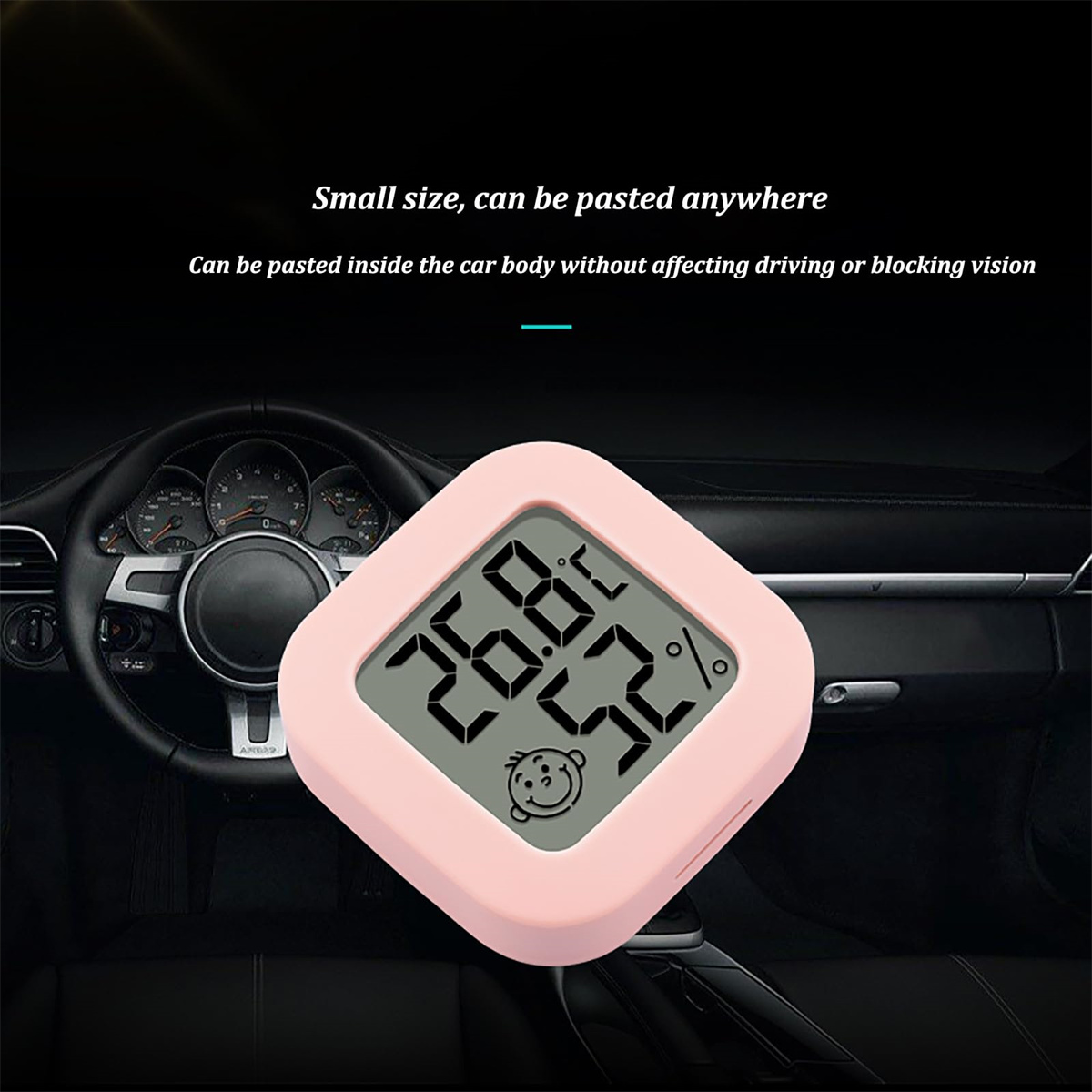 Rosa Autothermometer. Zeigt Temperatur und Luftfeuchtigkeit an. Hintergrund: Armaturenbrett.
