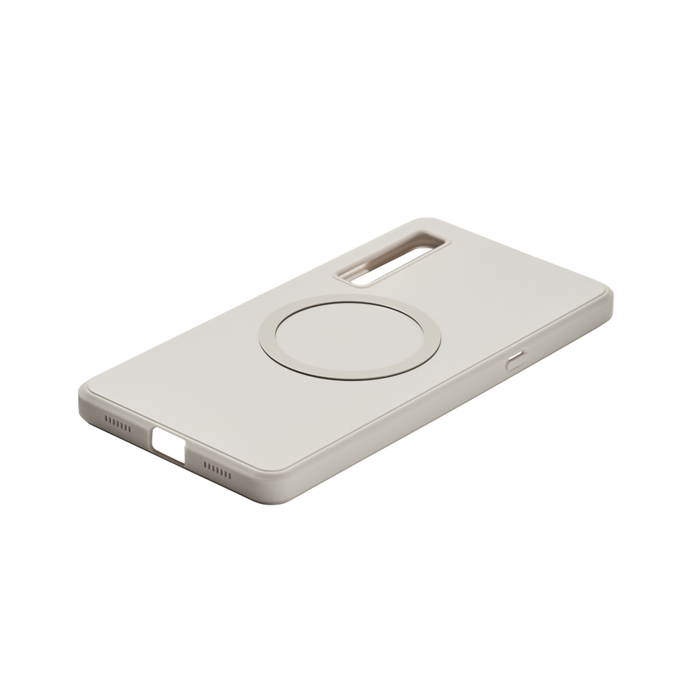 Una parte trasera gris claro de la funda del teléfono con un anillo magnético. La funda está en ángulo.