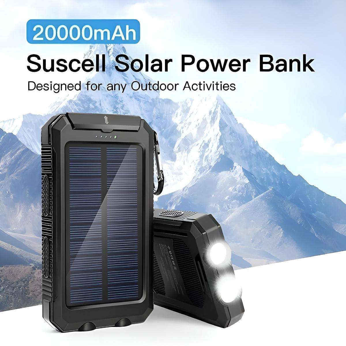 Schwarze Powerbank mit Solarpanel und zwei Lichtern, mit weißem Berg-Hintergrund.