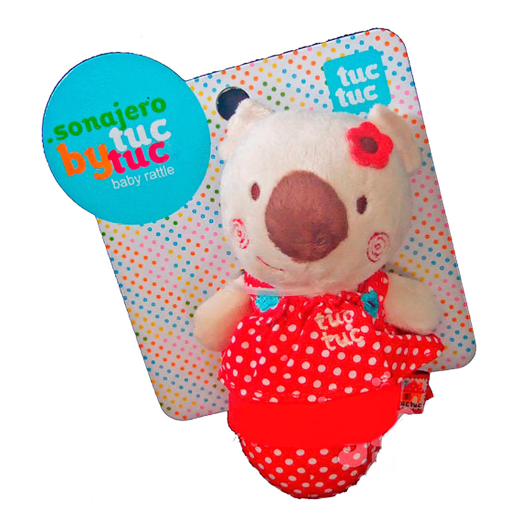 Juguete sonajero para bebé. Un oso de peluche con un vestido rojo de lunares.