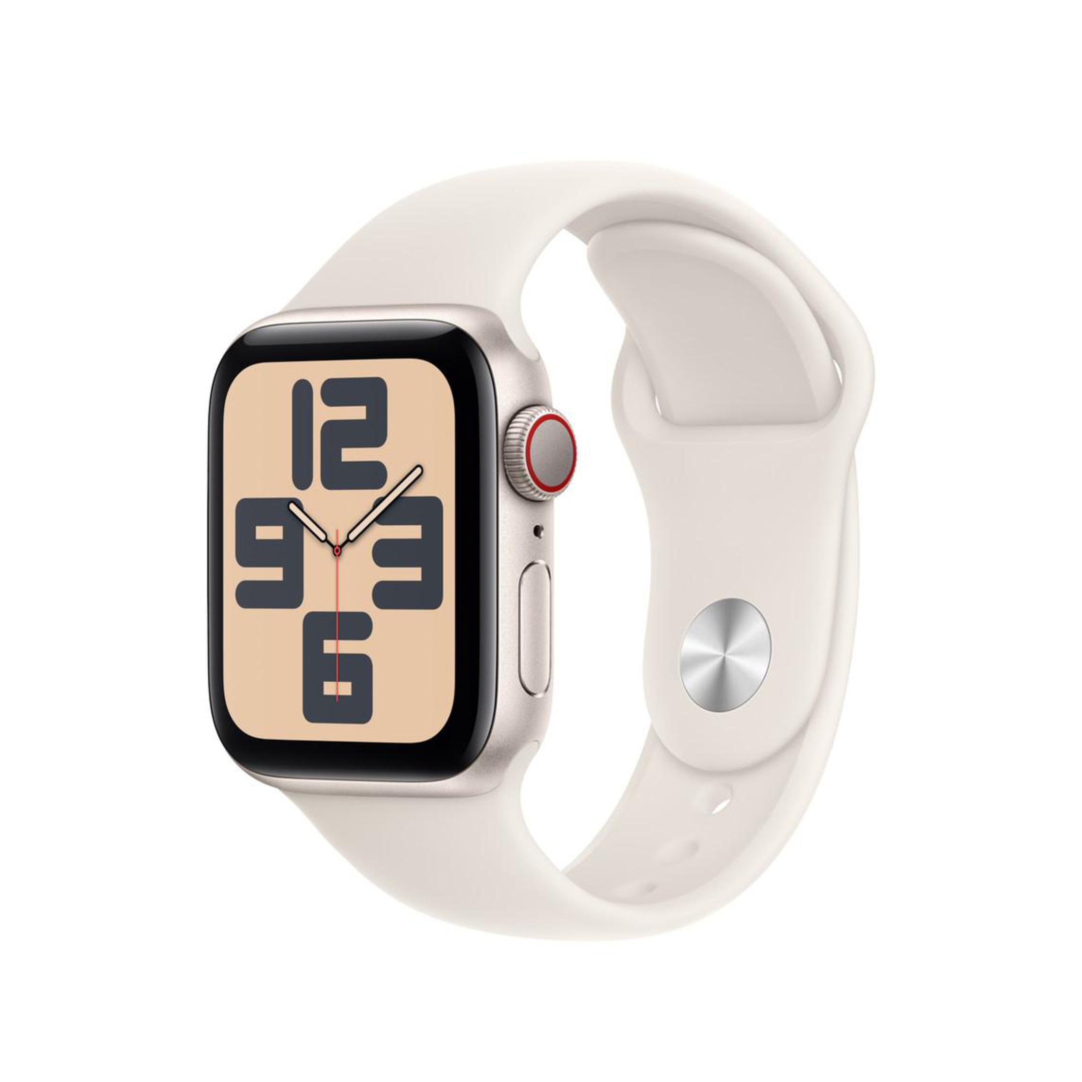 Apple Watch z kremowym paskiem i beżową tarczą. Godzina to 9:36. Ma czerwony przycisk.