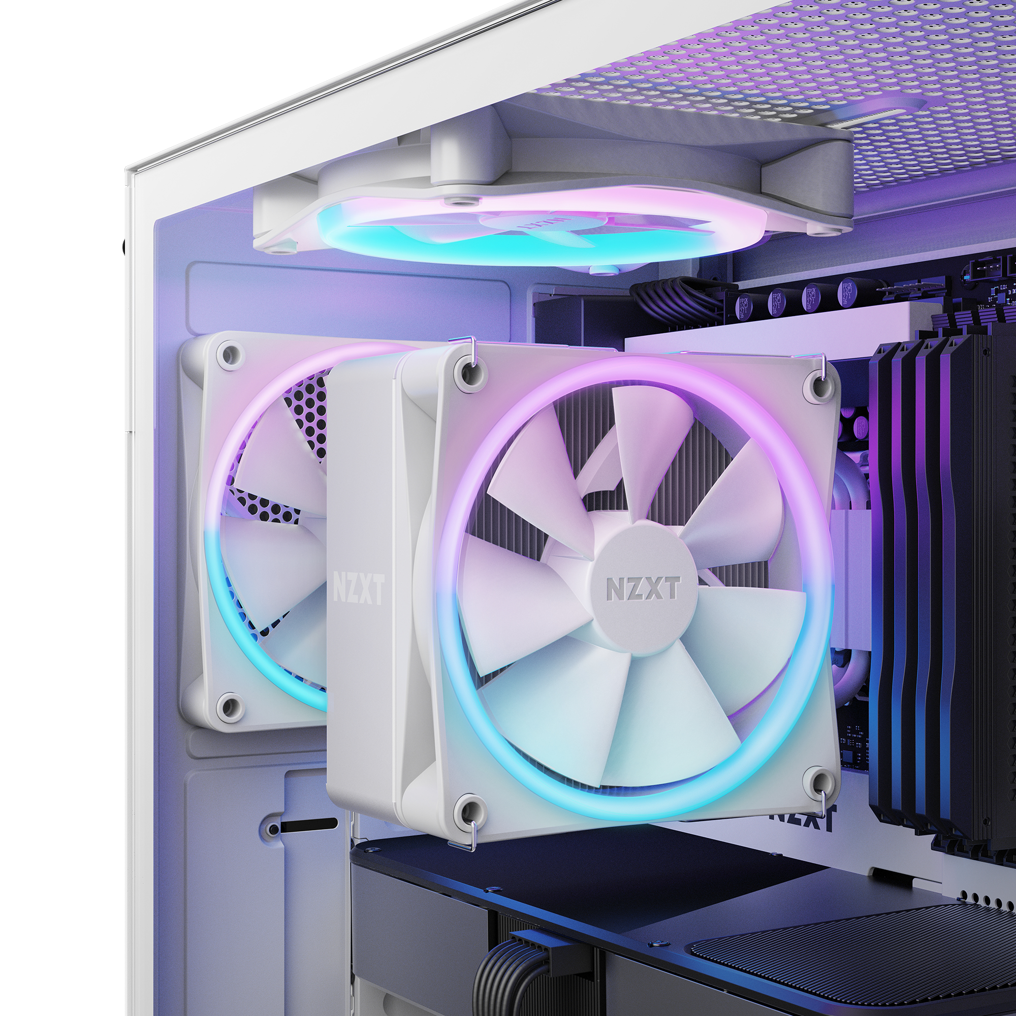 Inside a white computer case. Two white fans with RGB lighting are visible.