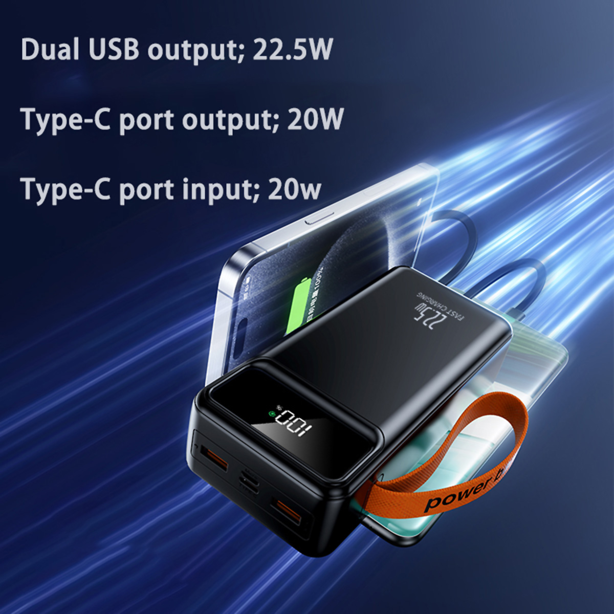 Batería externa negra con correa naranja. Está junto a un teléfono y muestra el 100%. Texto en el dispositivo: '22.5W'.