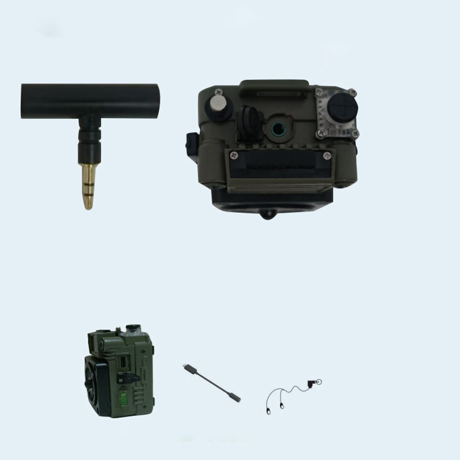 Verschiedene militärische Geräte, darunter ein Laservisier und ein Funkgerät.