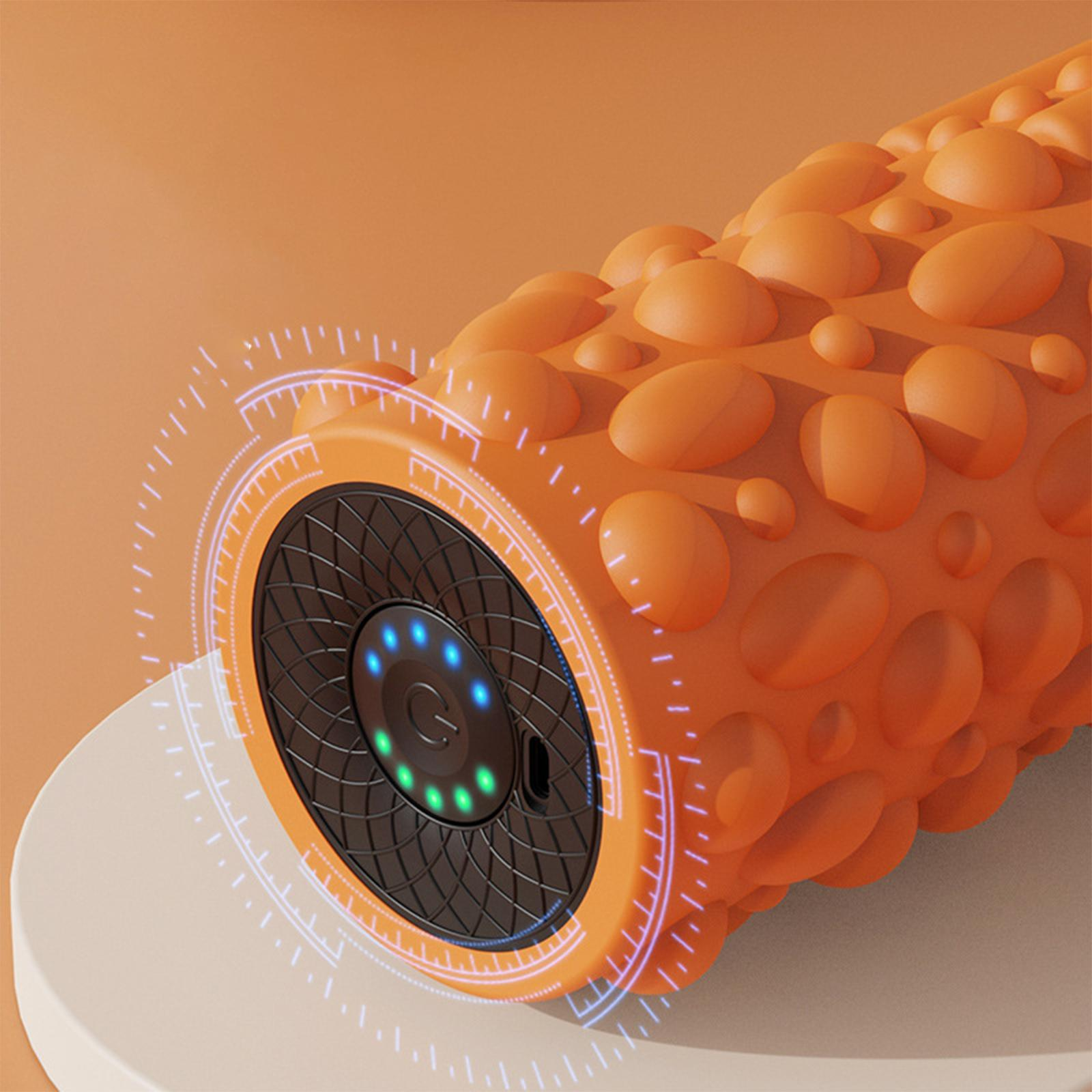 Nahaufnahme einer orangenen Massagerolle mit beleuchteter Digitalanzeige.
