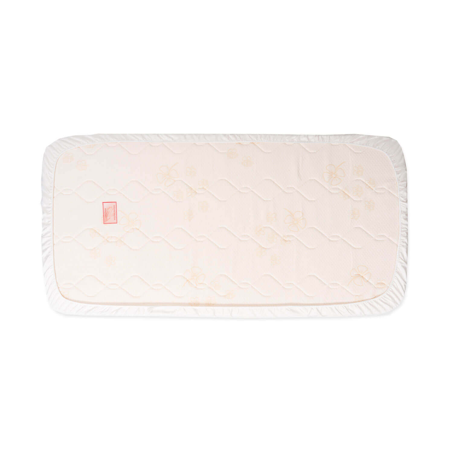 Colchón de bebé blanco con superficie estampada y borde blanco.