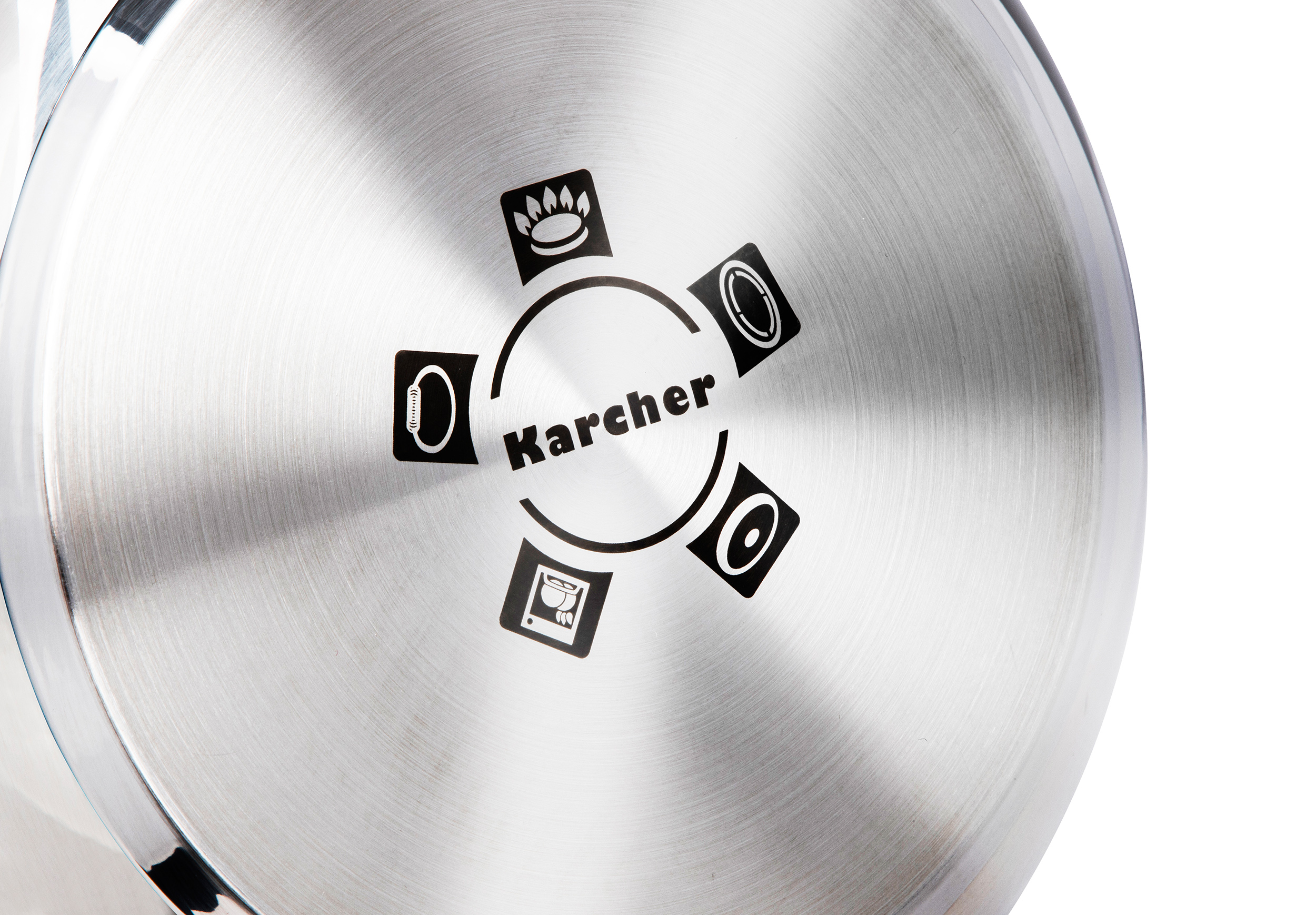 Nahaufnahme des Bodens eines Topfes mit Karcher-Logo und Kochsymbolen.