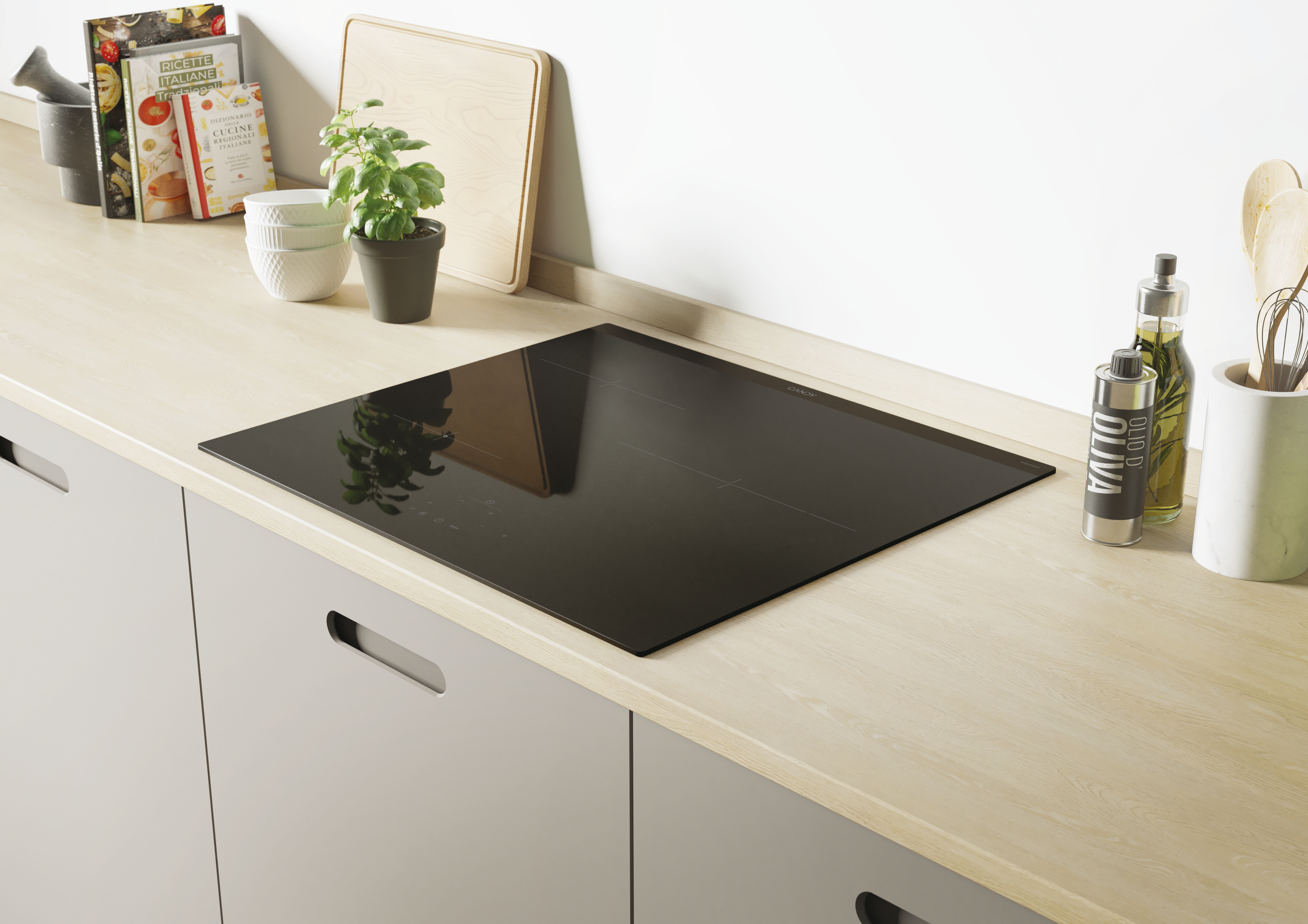 Placa de inducción negra sobre encimera de madera. Escena de cocina con objetos en el fondo.