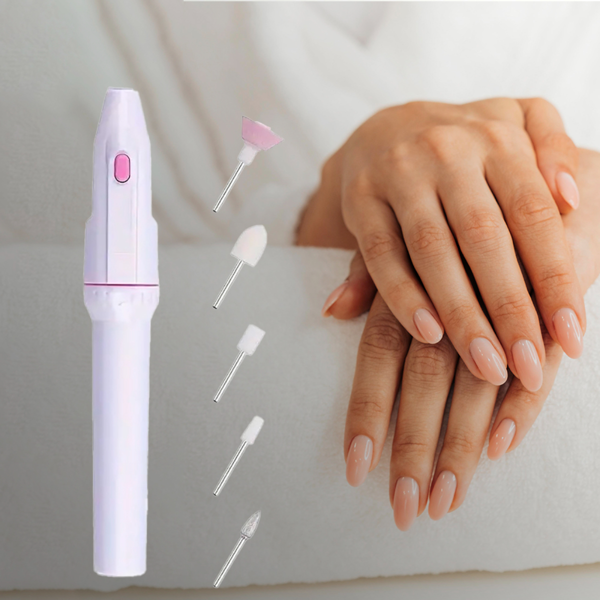 Taladro de uñas blanco con botón rosa. Mano con uñas manicuradas.