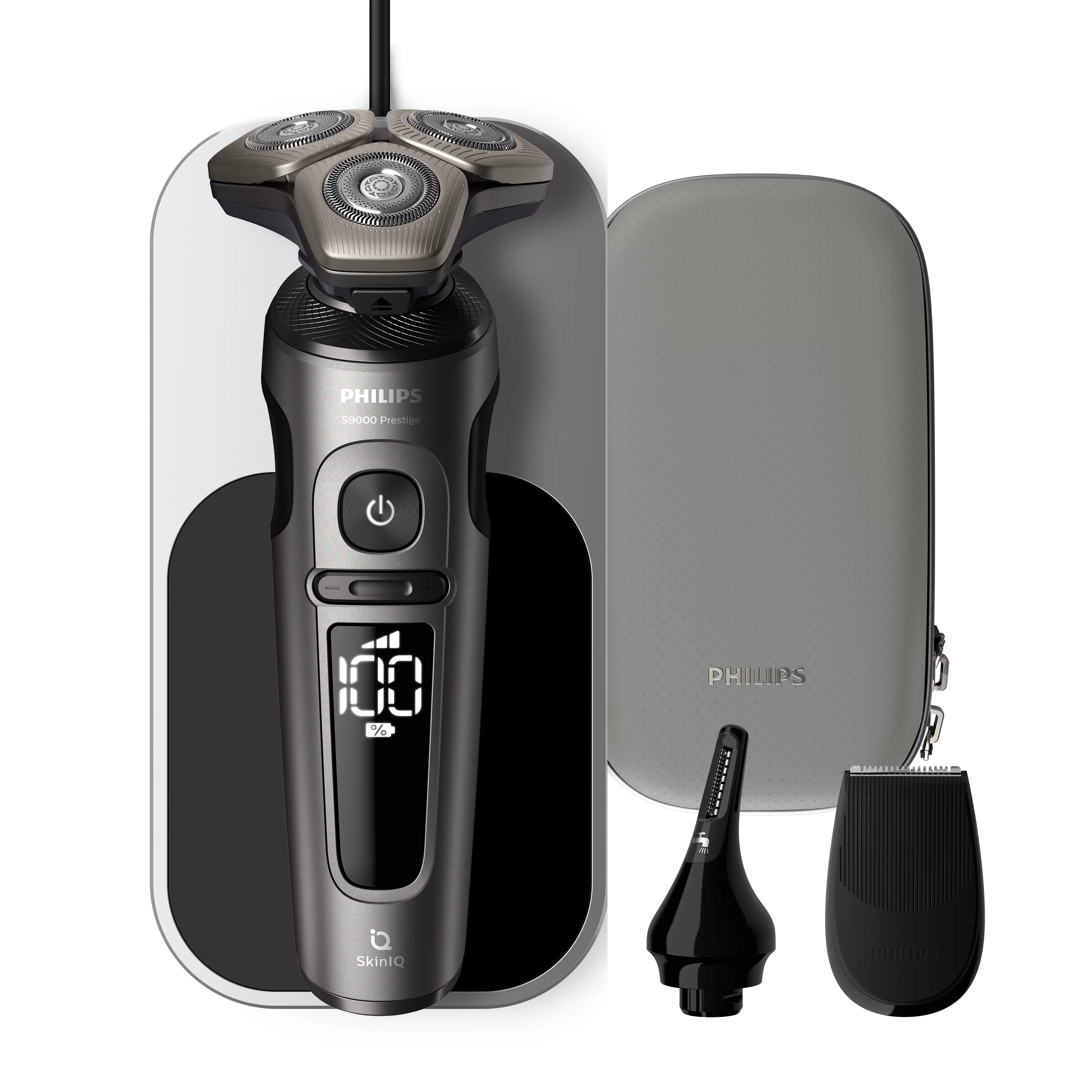 Una afeitadora Philips plateada, base de carga y accesorios.