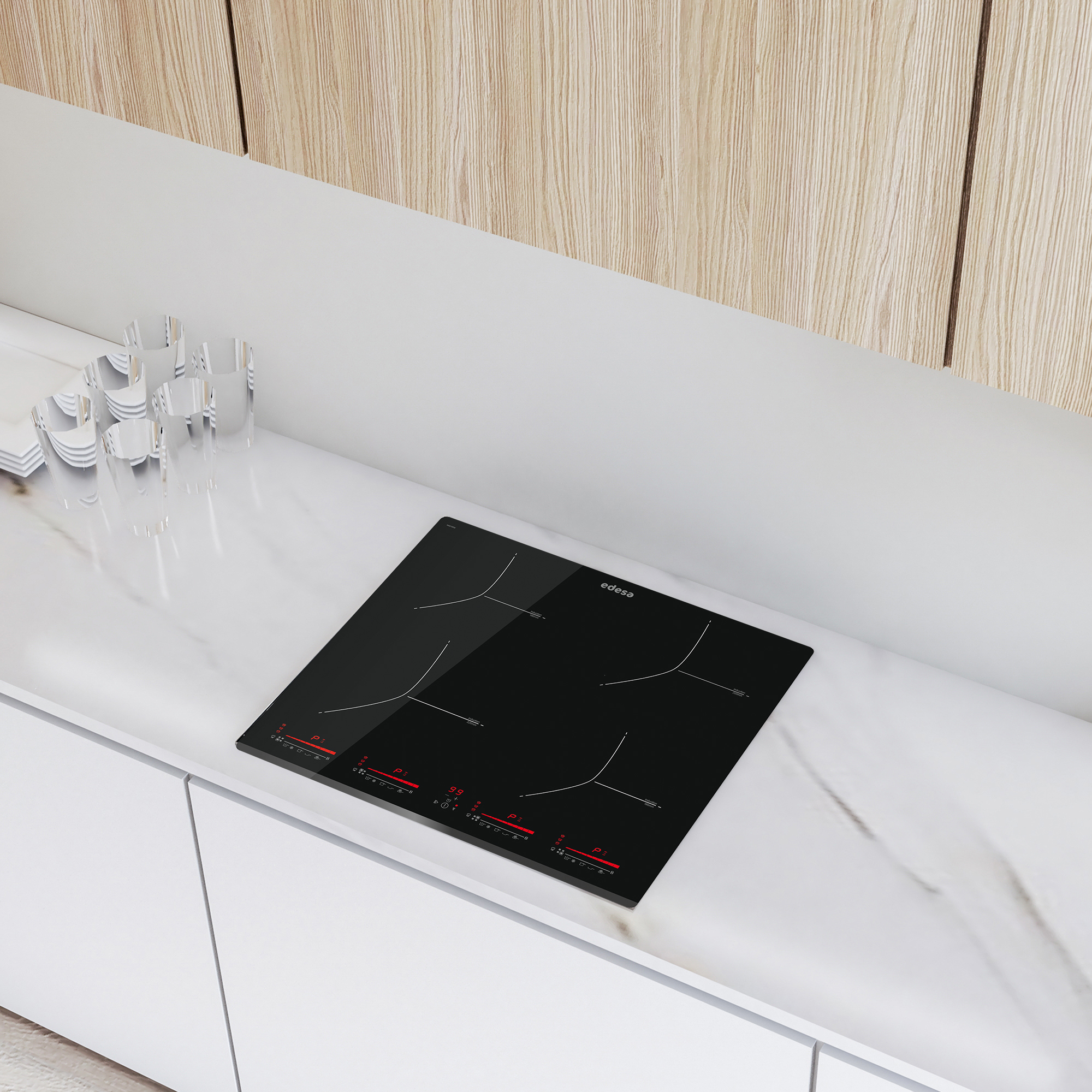 Nowoczesna kuchnia z czarną płytą grzejną. Biały blat i szafki, szklane wazony. Marka to Edesa.