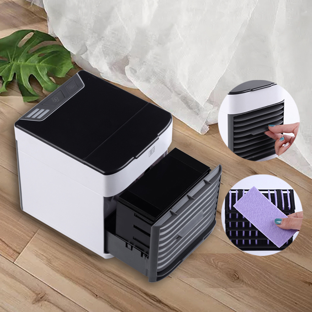Enfriador de aire blanco y negro con cajón abierto que muestra un depósito de agua. Se muestran otros detalles.