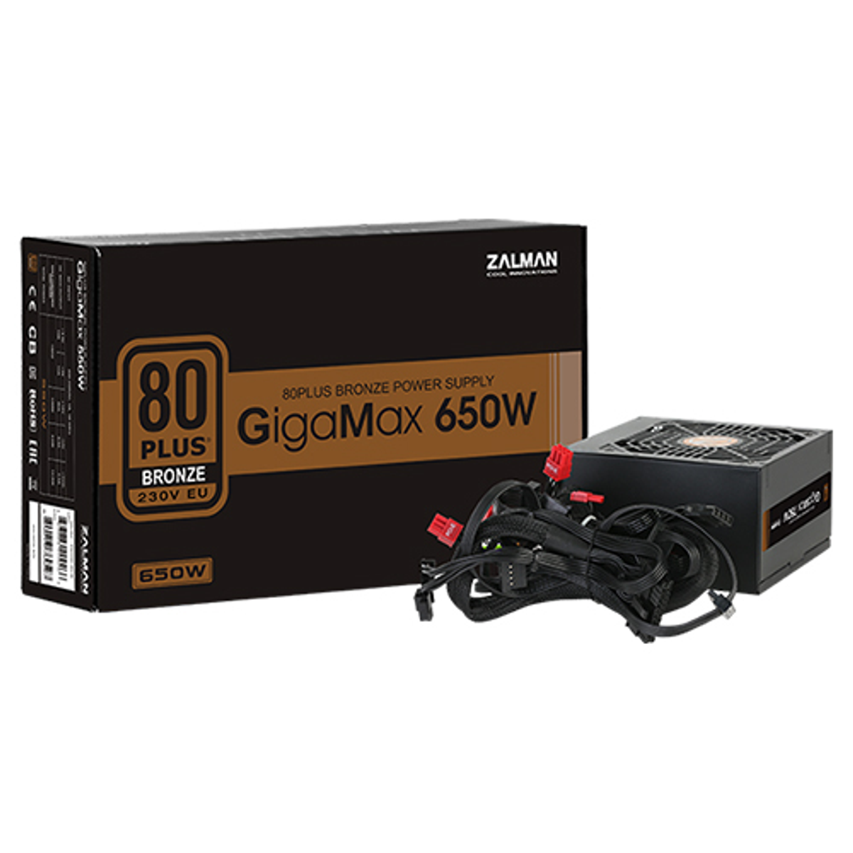 Czarny zasilacz i pudełko z etykietą Gigamax 650W. Kable wychodzą z zasilacza.