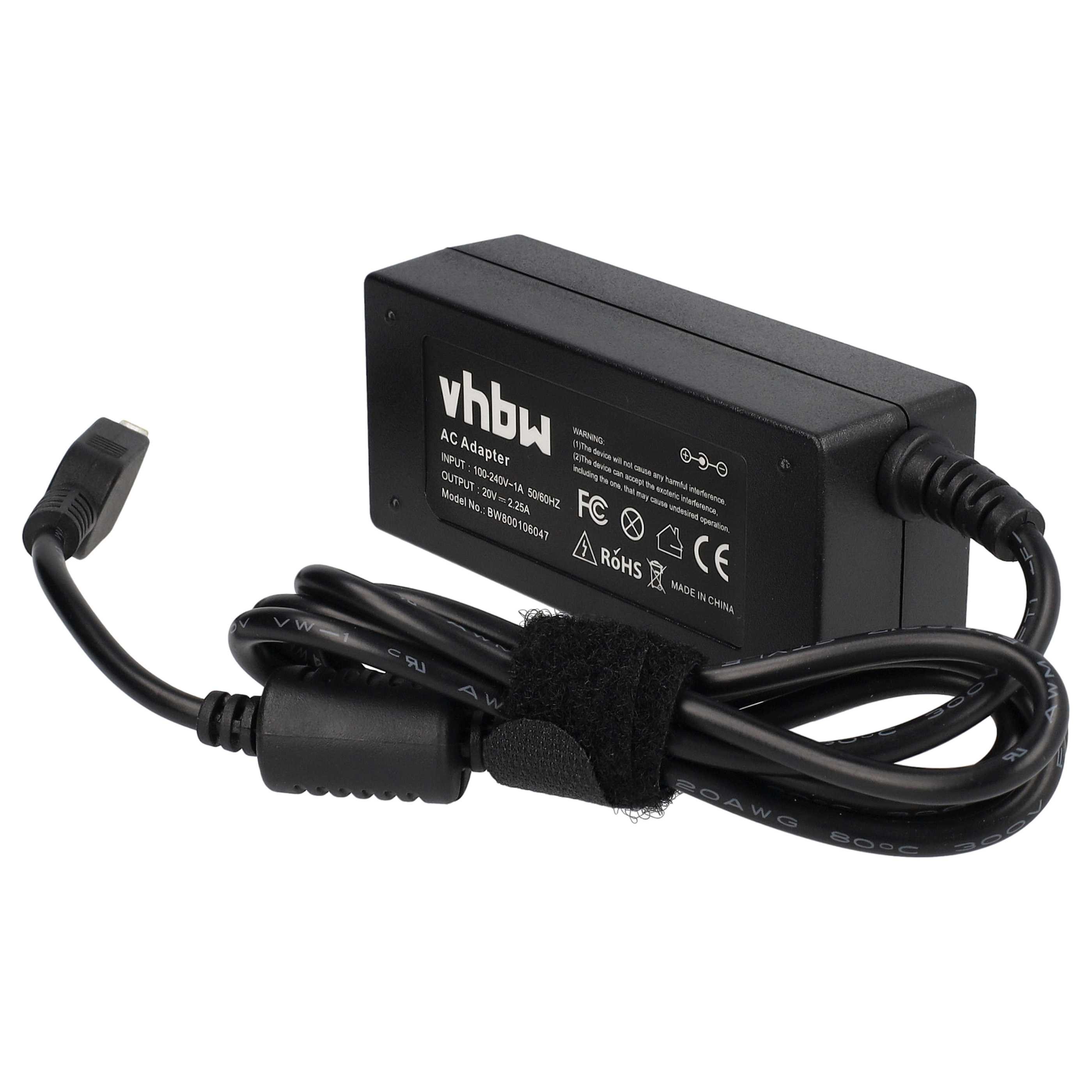 Schwarzer AC-Adapter mit USB-Anschluss. Der Text darauf lautet 'vhbw'.