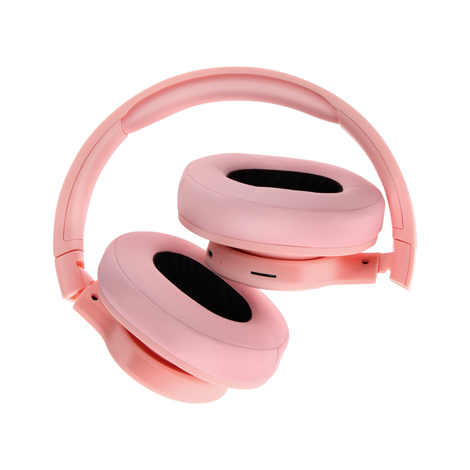 Gefaltete rosa Kopfhörer. Over-Ear-Kopfhörer. Weißer Hintergrund.