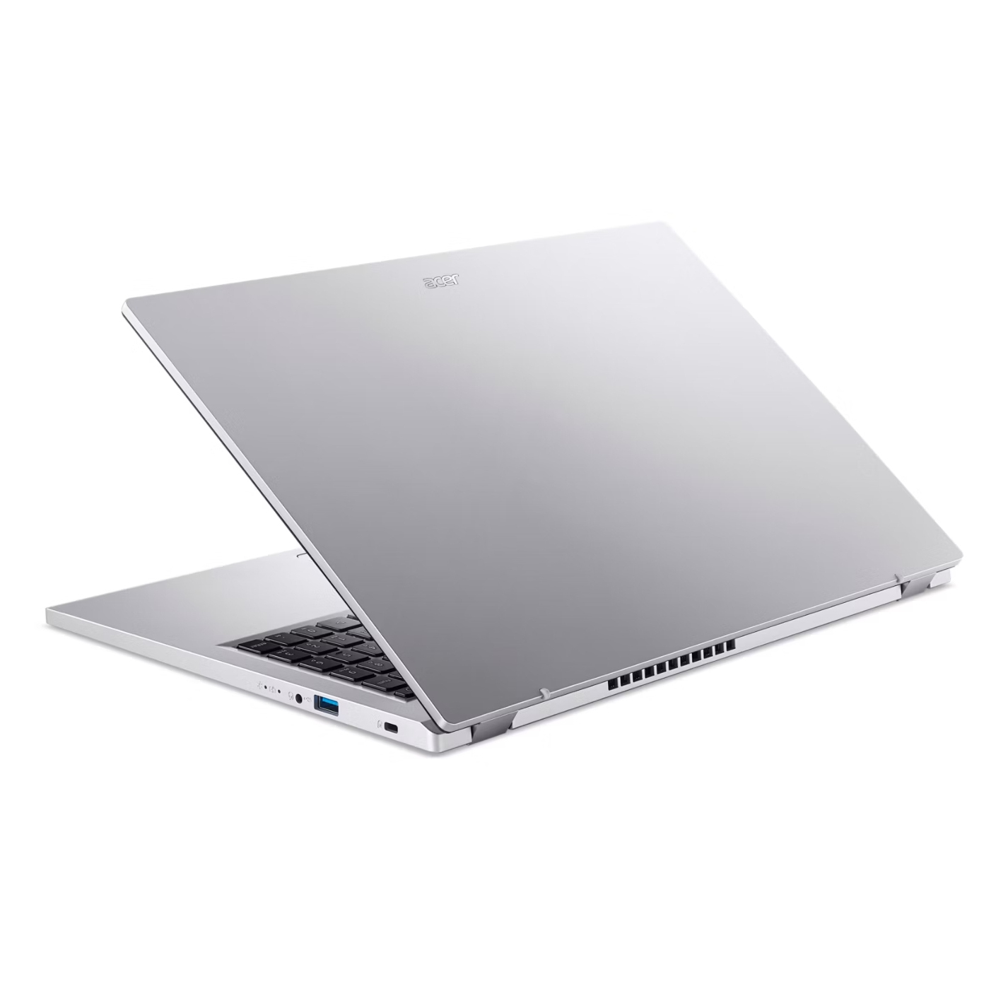 Un laptop argentato con tastiera nera, aperto su una superficie bianca.
