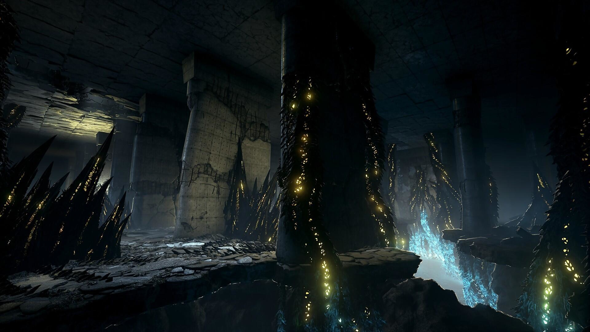 Ciemna jaskinia z świecącymi strukturami i skalistą podłogą.