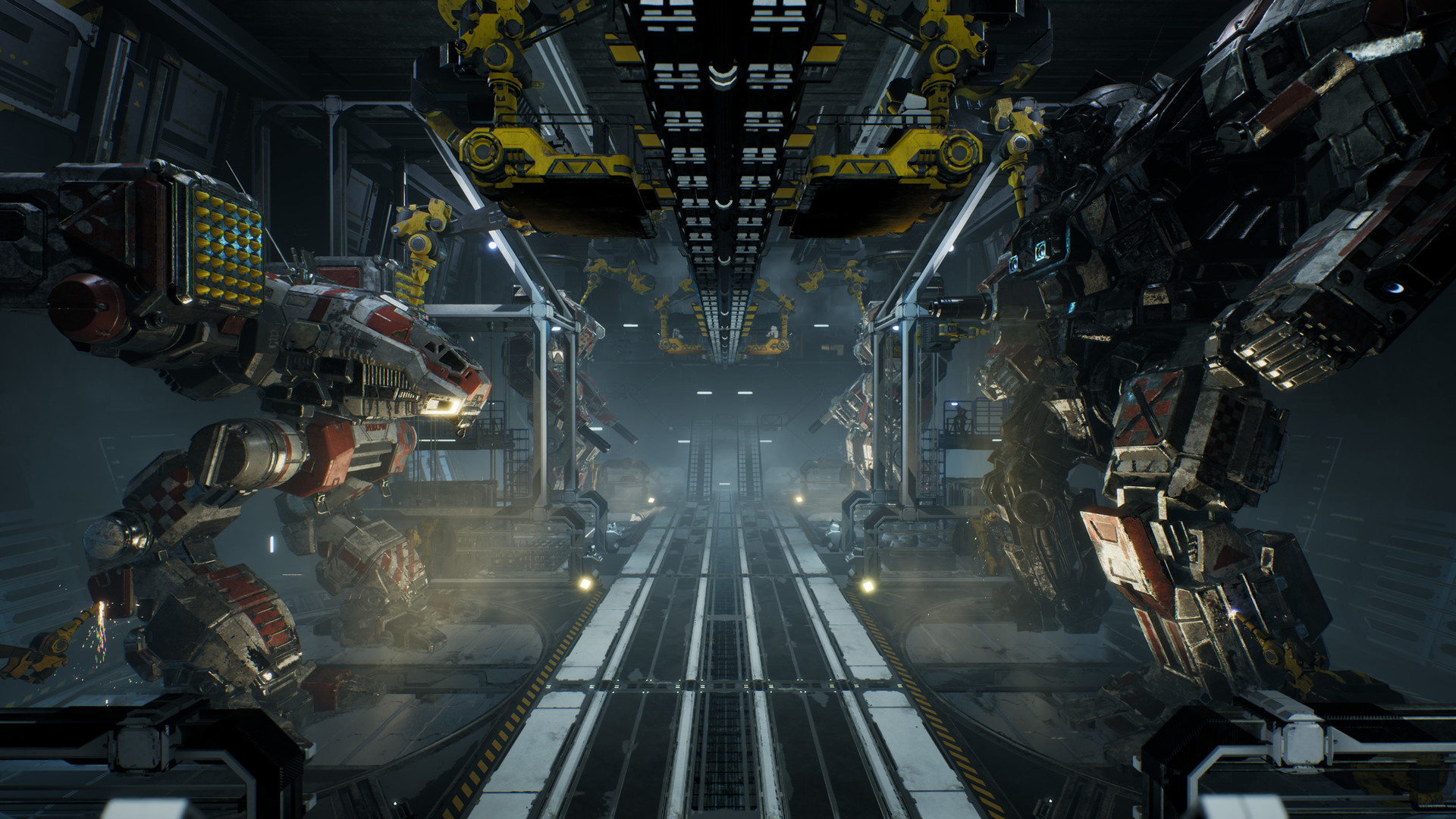 Zwei große Mechs in einem Hangar. Gelbe Tragwerke sind sichtbar.