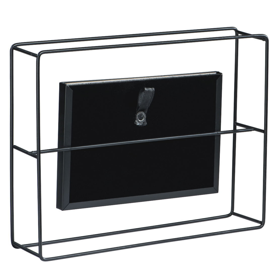 Czarna metalowa rama z oprawionym zdjęciem w środku. Widoczny tył zdjęcia.