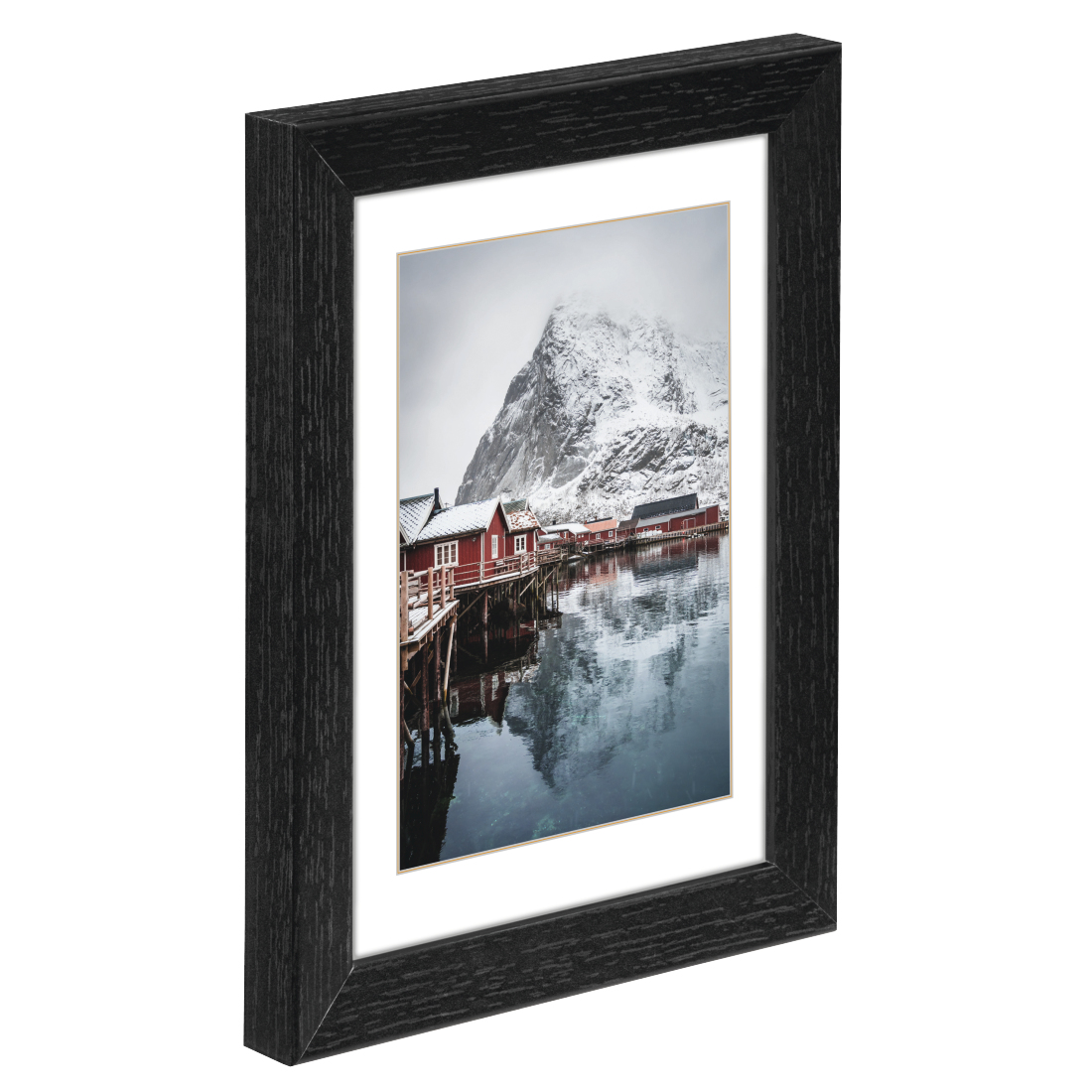 Bilderrahmen mit einem Bild darin. Das Bild ist eine Küstenlandschaft mit roten Häusern und Schnee.