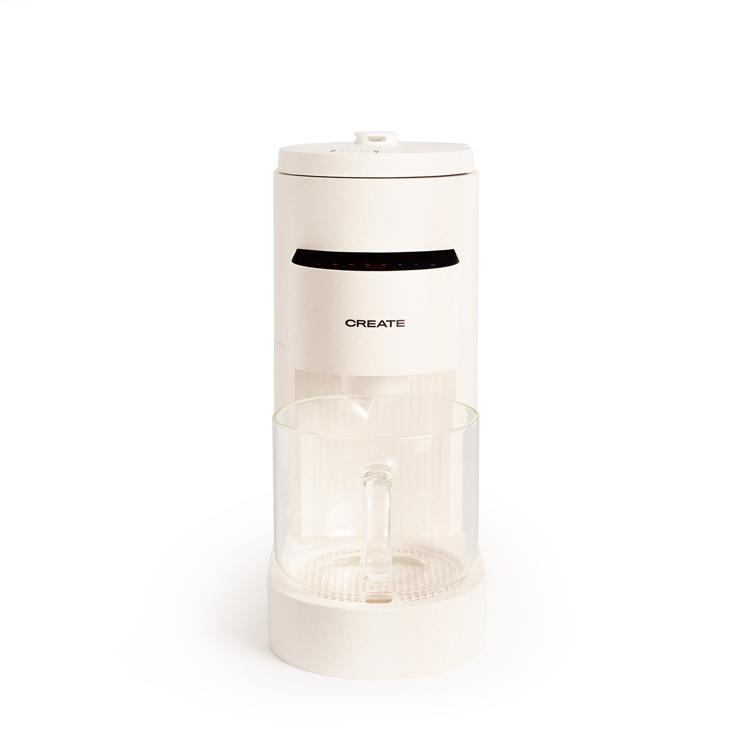 Cafetera blanca con un recipiente de vidrio.